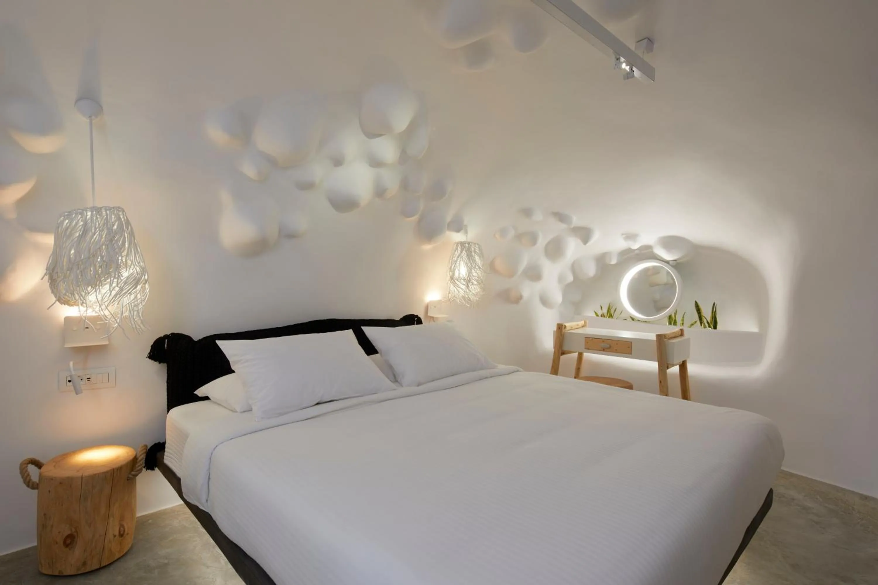 Bed in Theano Cave Suites & Villas