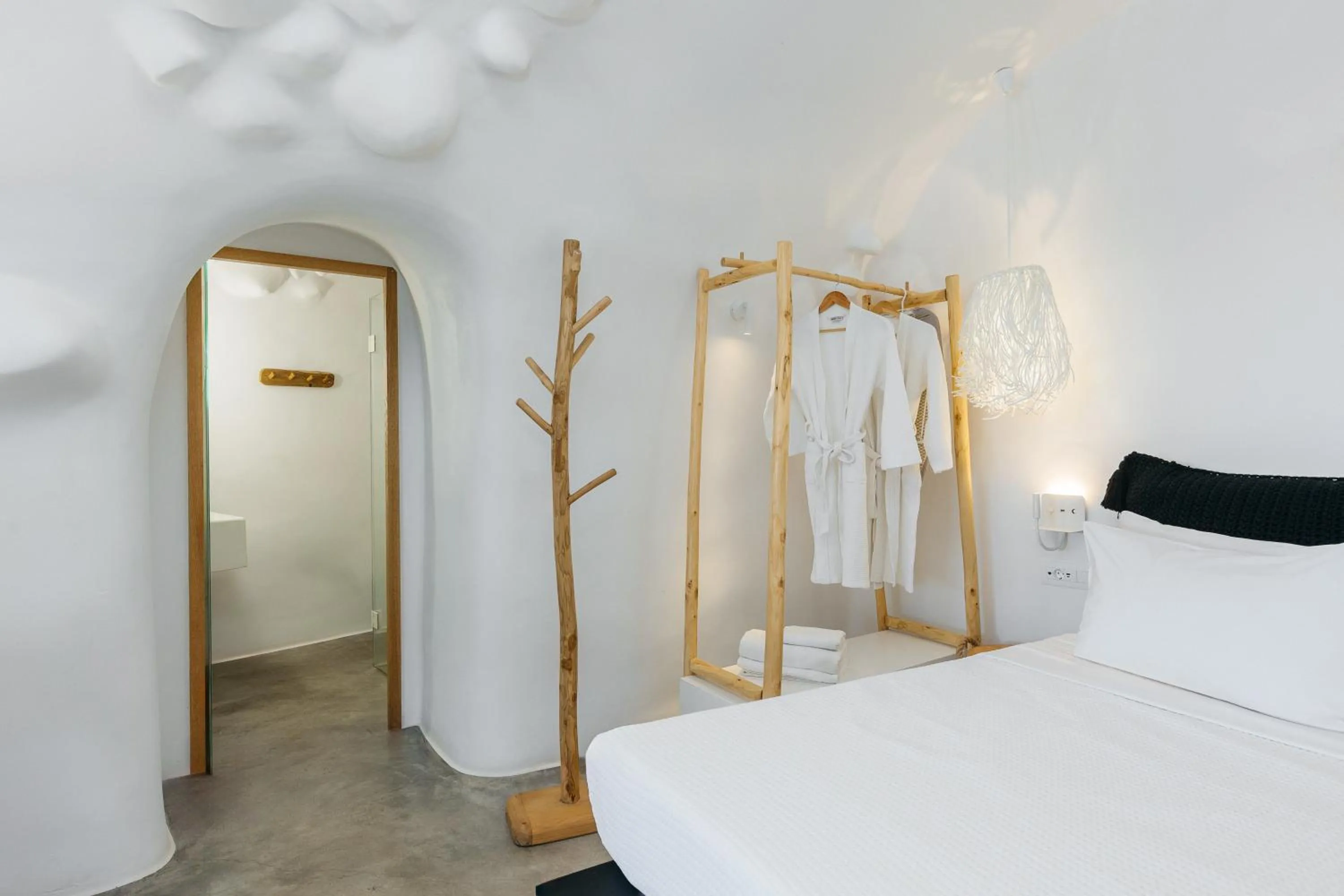 Bed in Theano Cave Suites & Villas