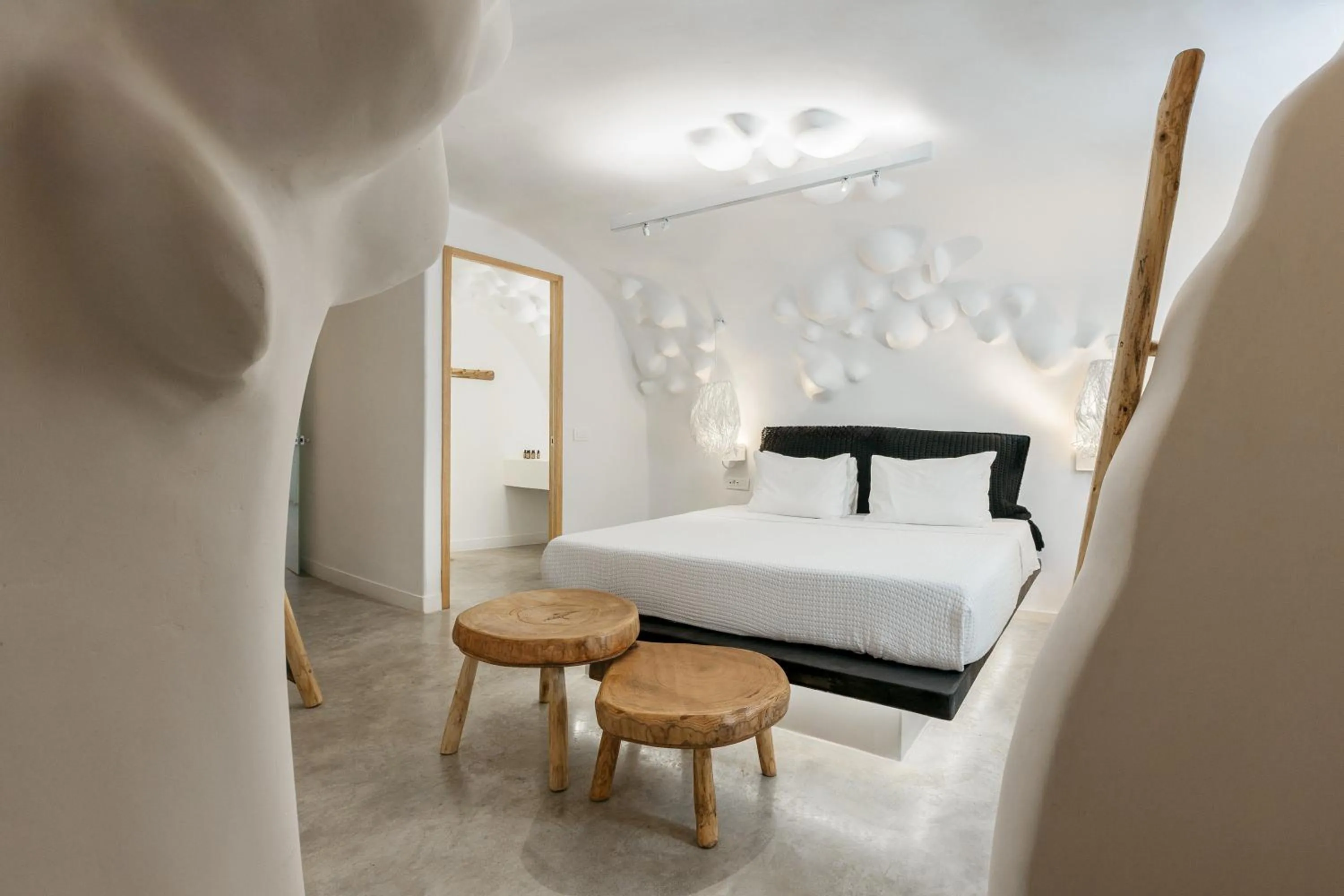 Bed in Theano Cave Suites & Villas