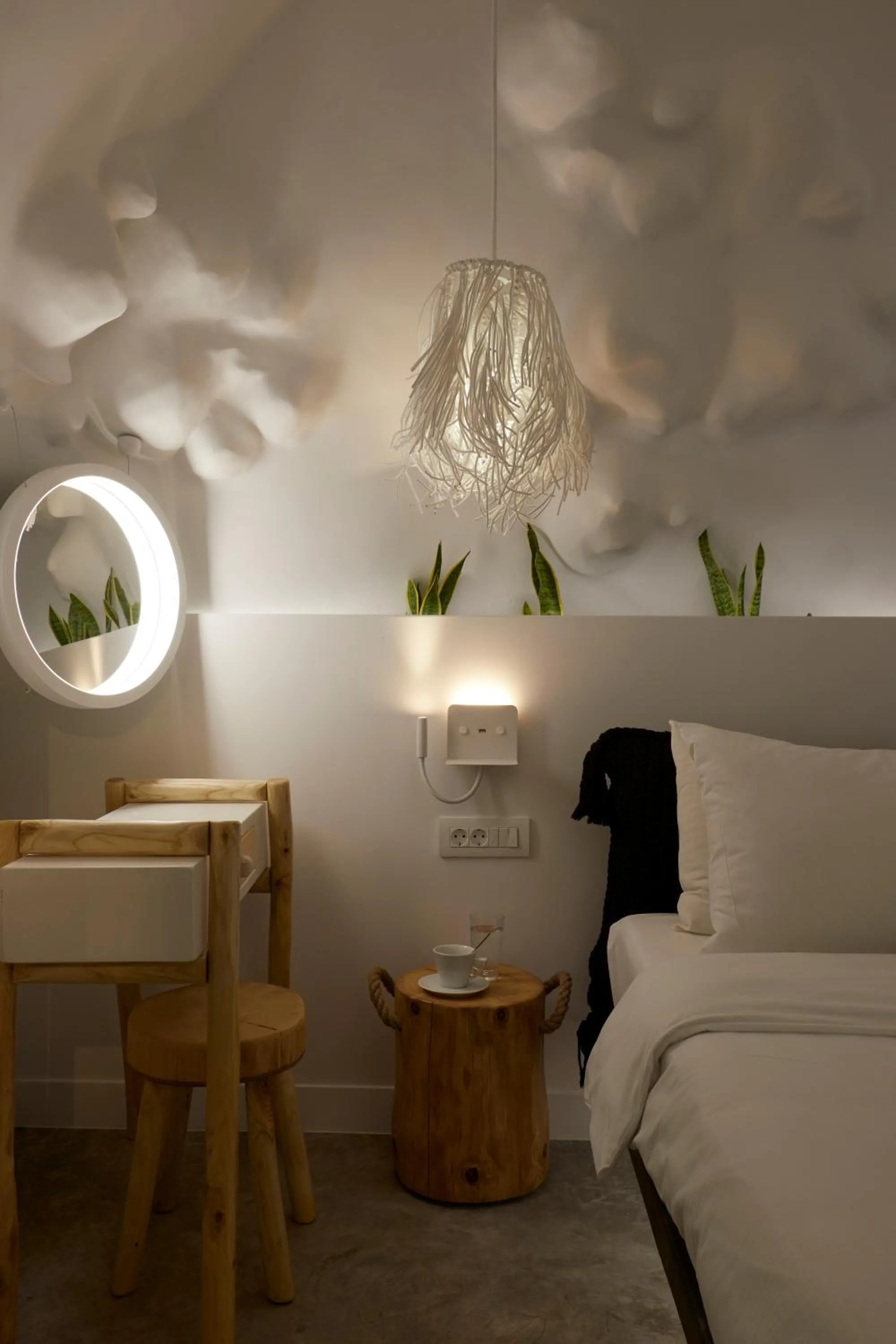 Bed in Theano Cave Suites & Villas