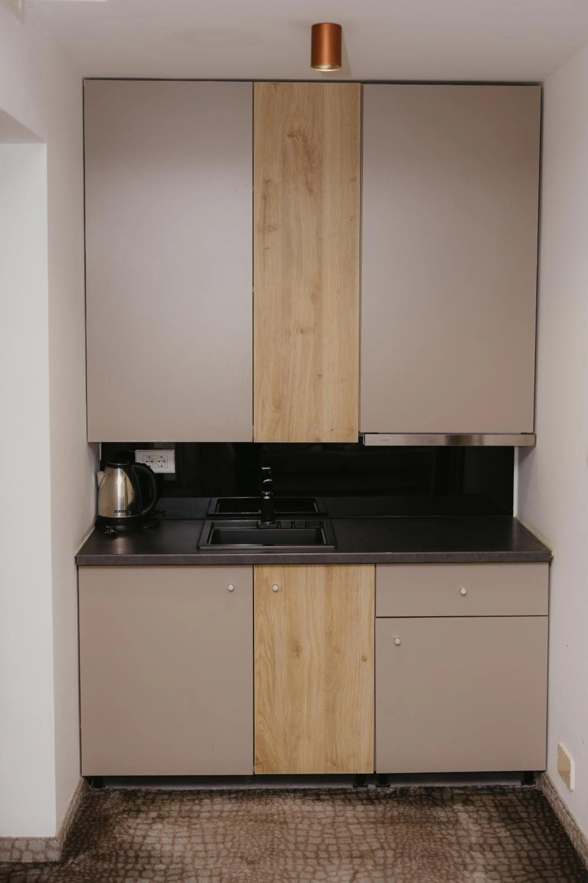 Kitchen or kitchenette in Hotel Koncept Residence