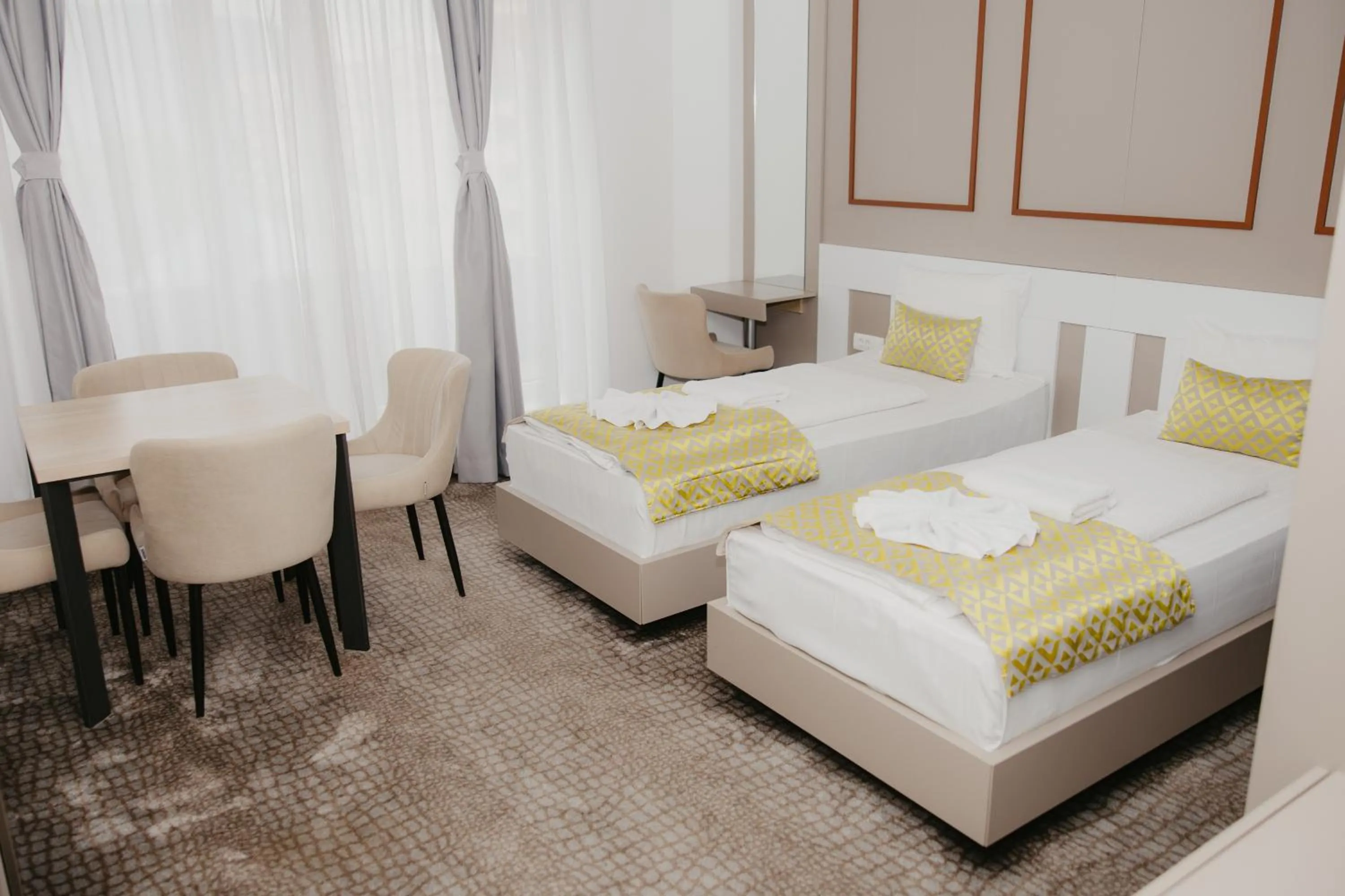 Seating area, Bed in Hotel Koncept Residence