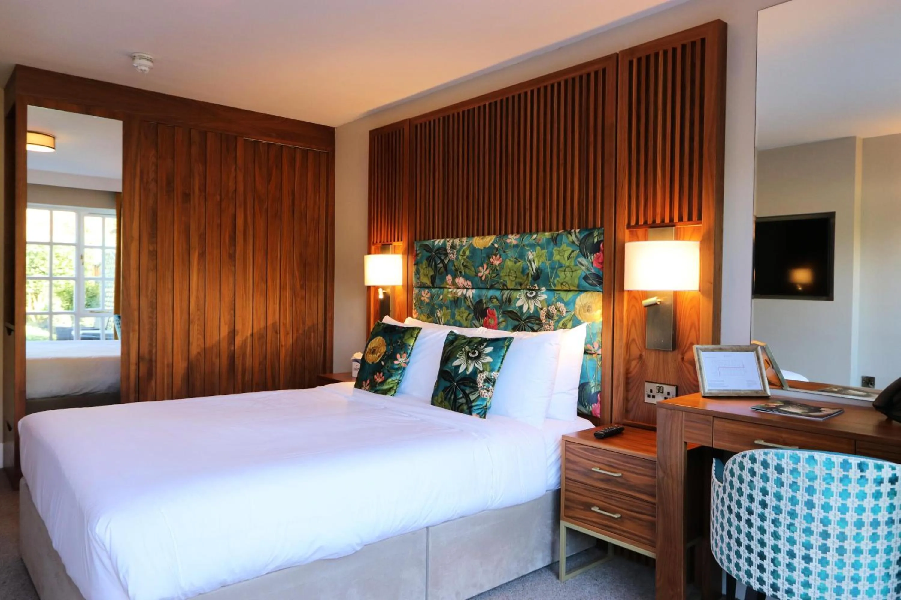 Bed in The Haycock Manor Hotel