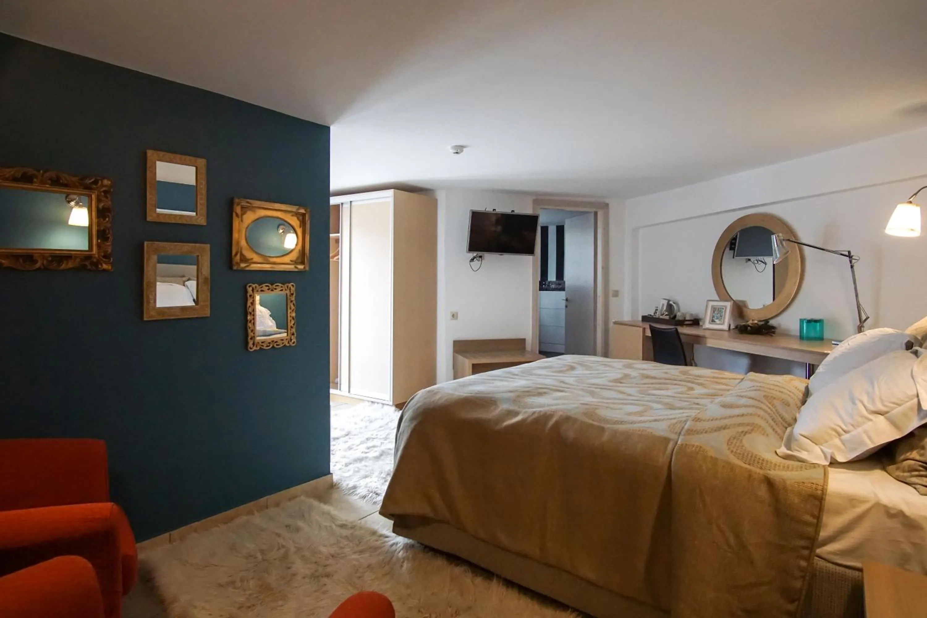 Bed in Forest Suites Boutique Hotel