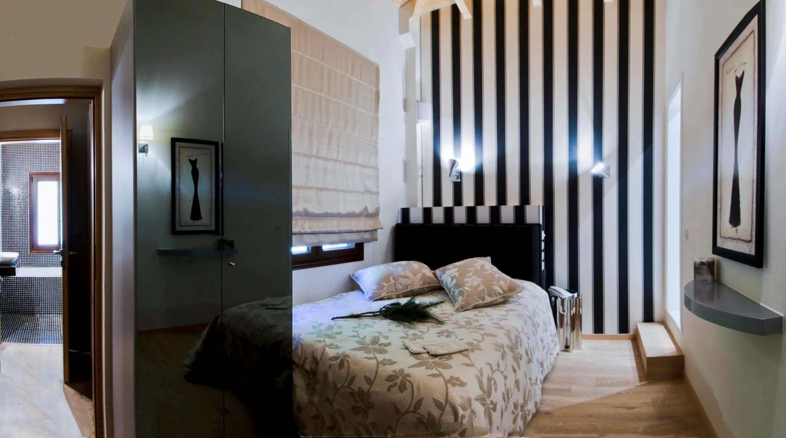 Bed in Forest Suites Boutique Hotel