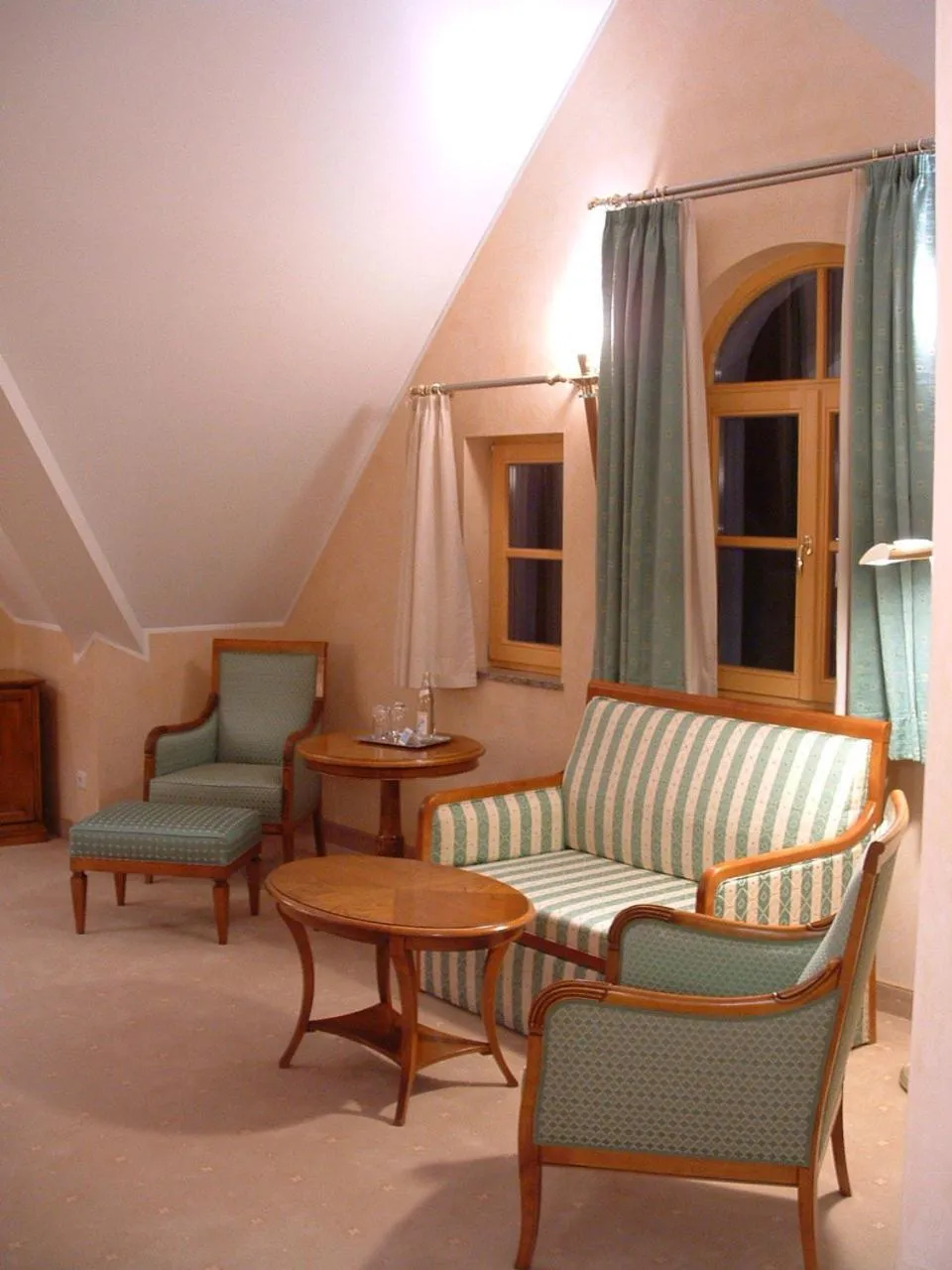 Communal lounge/ TV room in Altstadthotel Bräuwirt