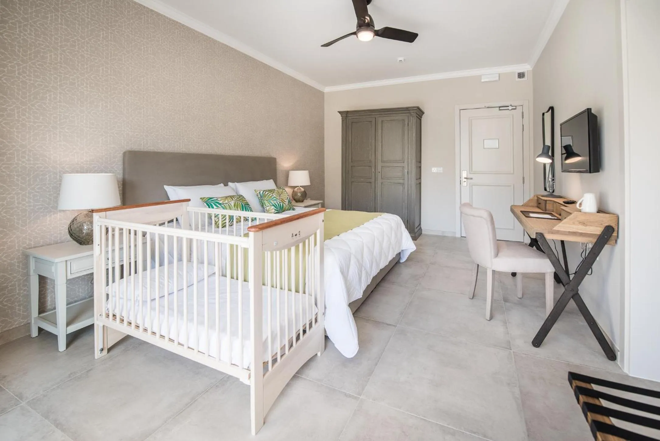 Bed in Cesca's Boutique Hotel