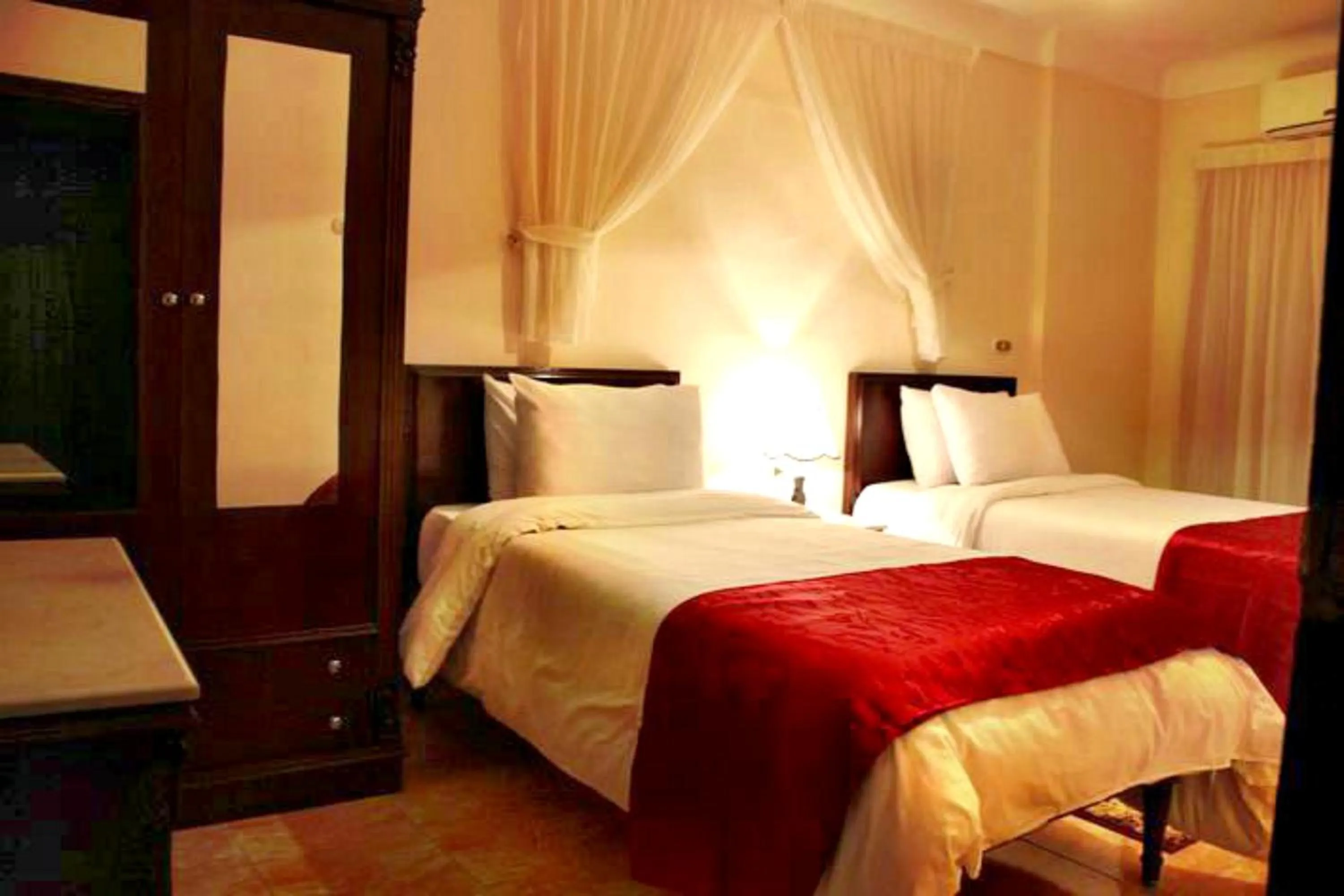 Bed in Alexandria Mediterranean Suites