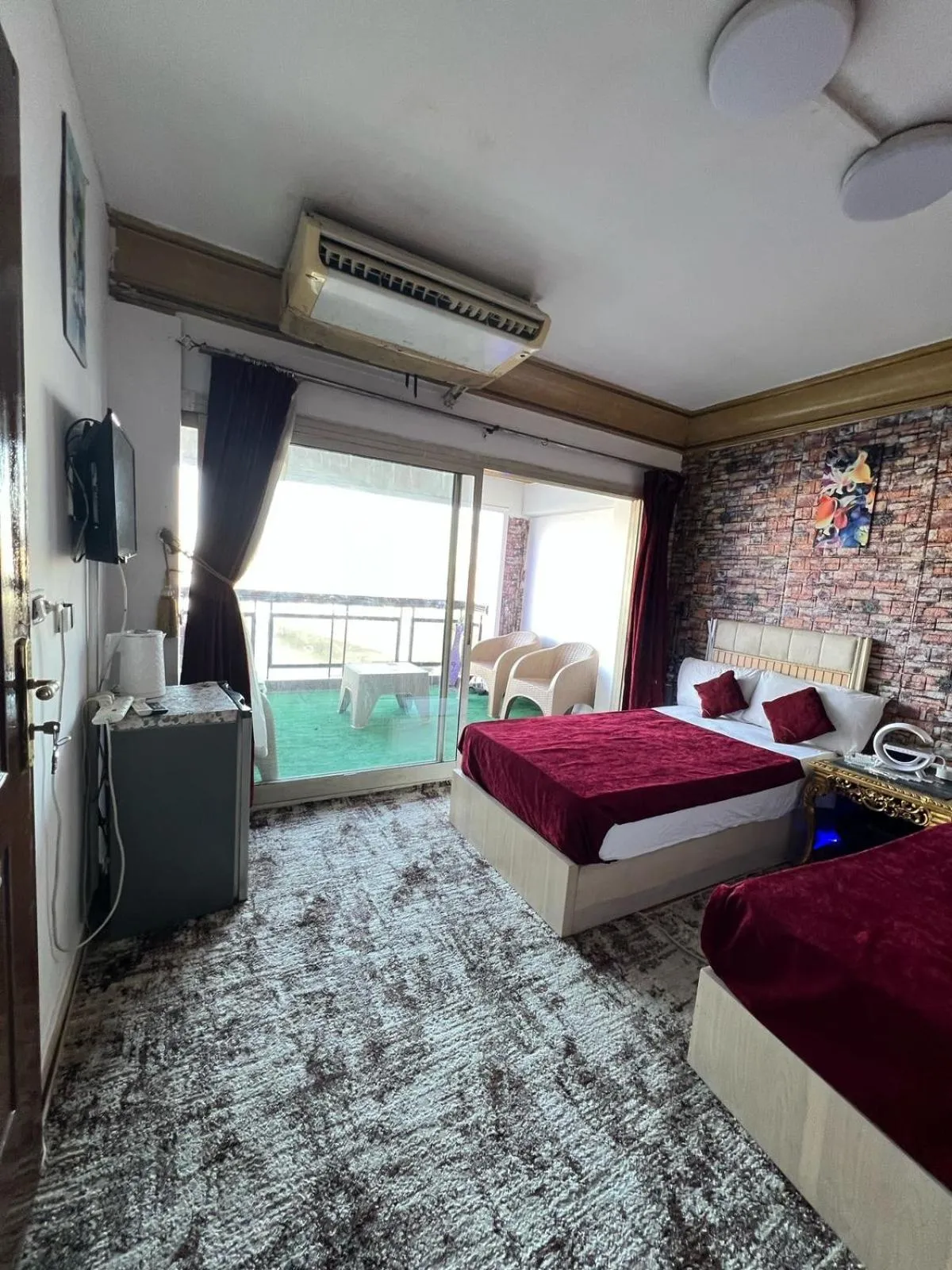 Communal lounge/ TV room, Bed in Nile Star Suites &Apartment