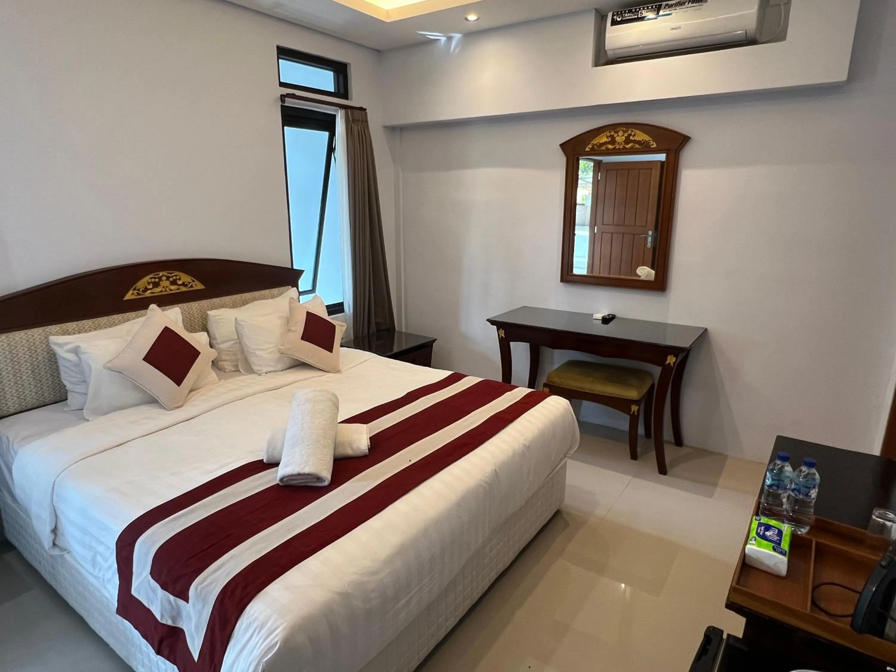 Bed in Mandhasativa Homestay