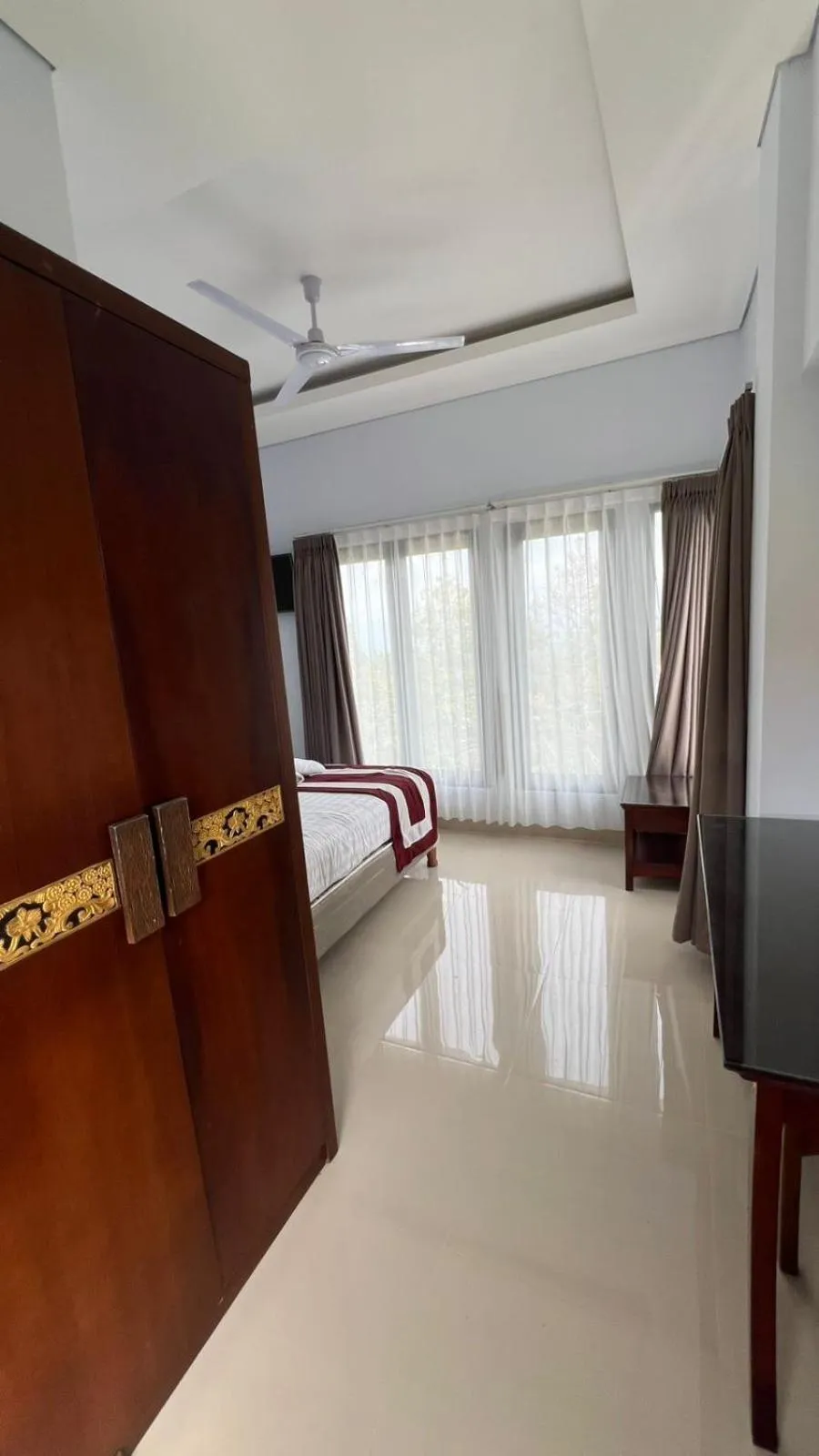 Bed in Mandhasativa Homestay