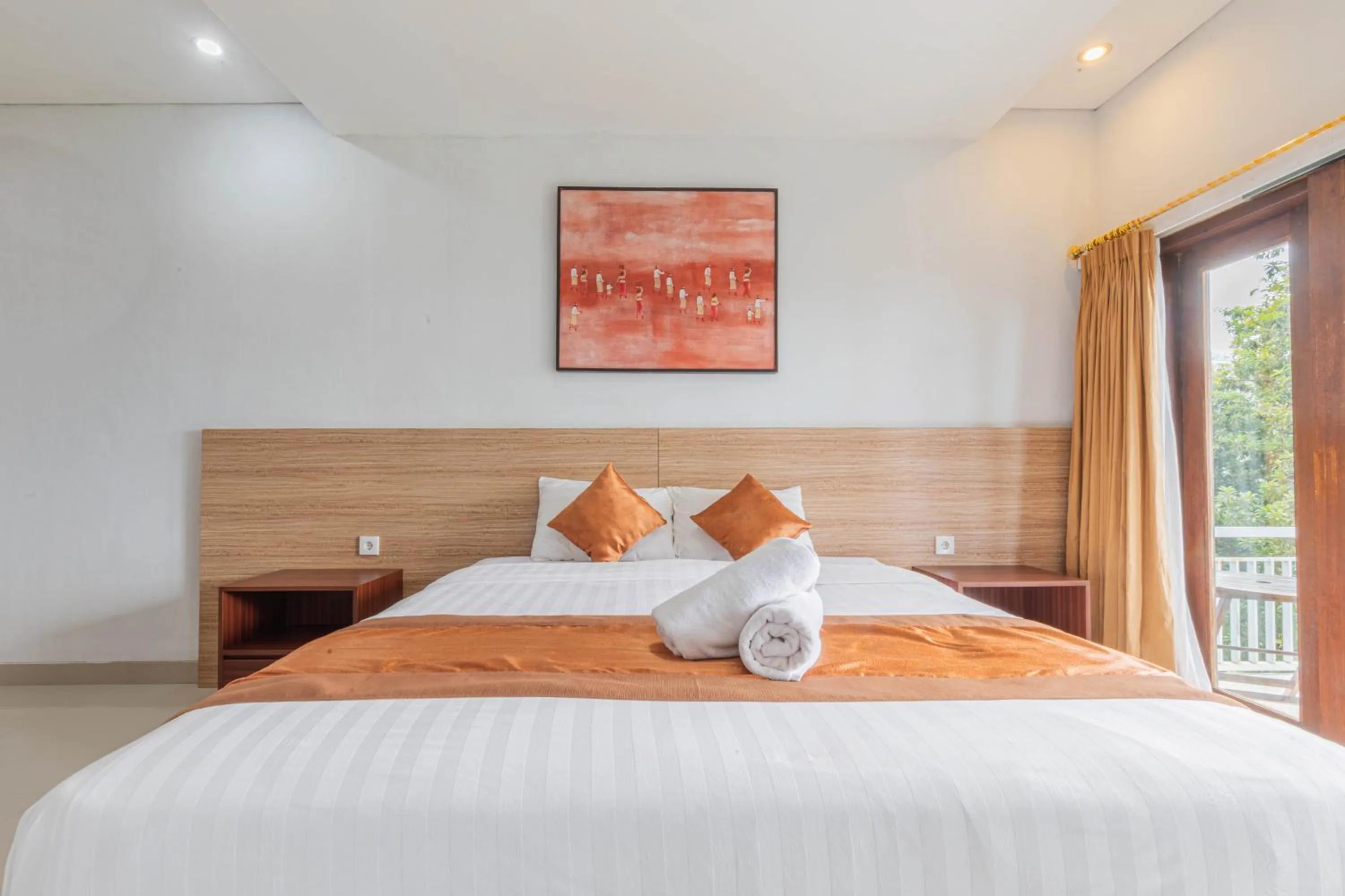 Bed in Mandhasativa Homestay