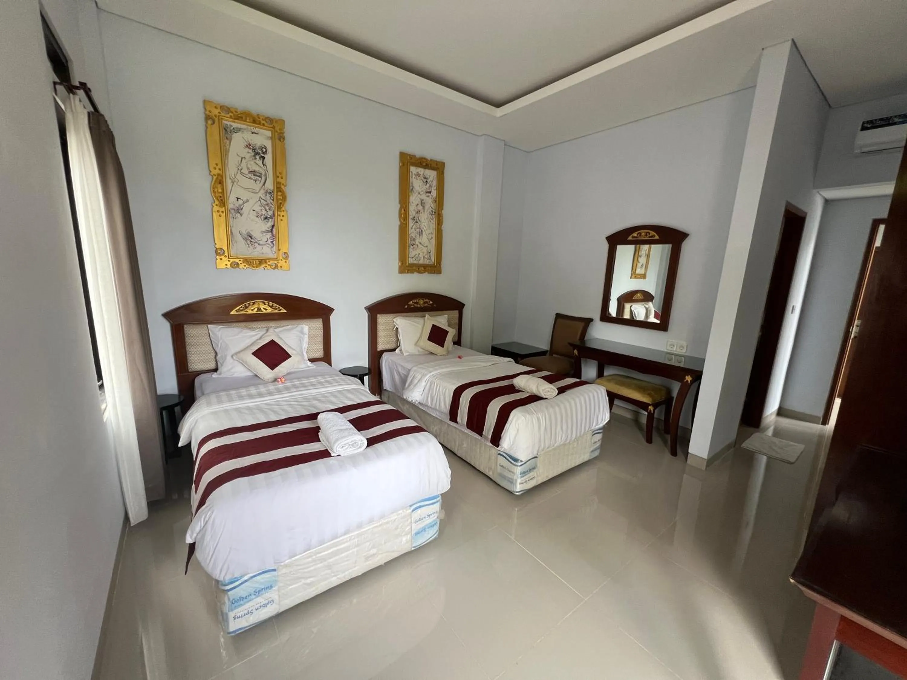 Bed in Mandhasativa Homestay