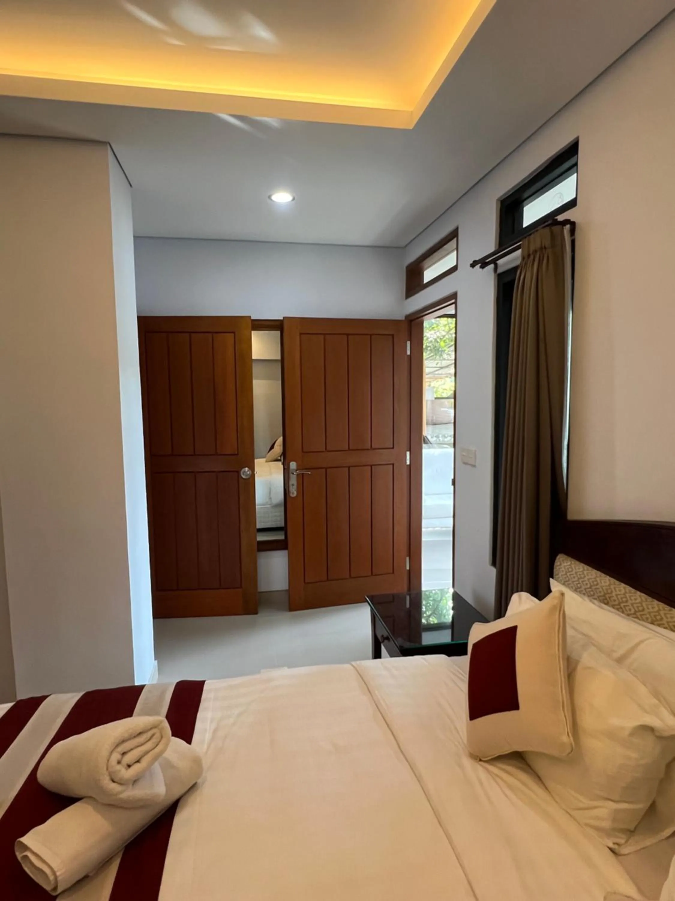 Bed in Mandhasativa Homestay