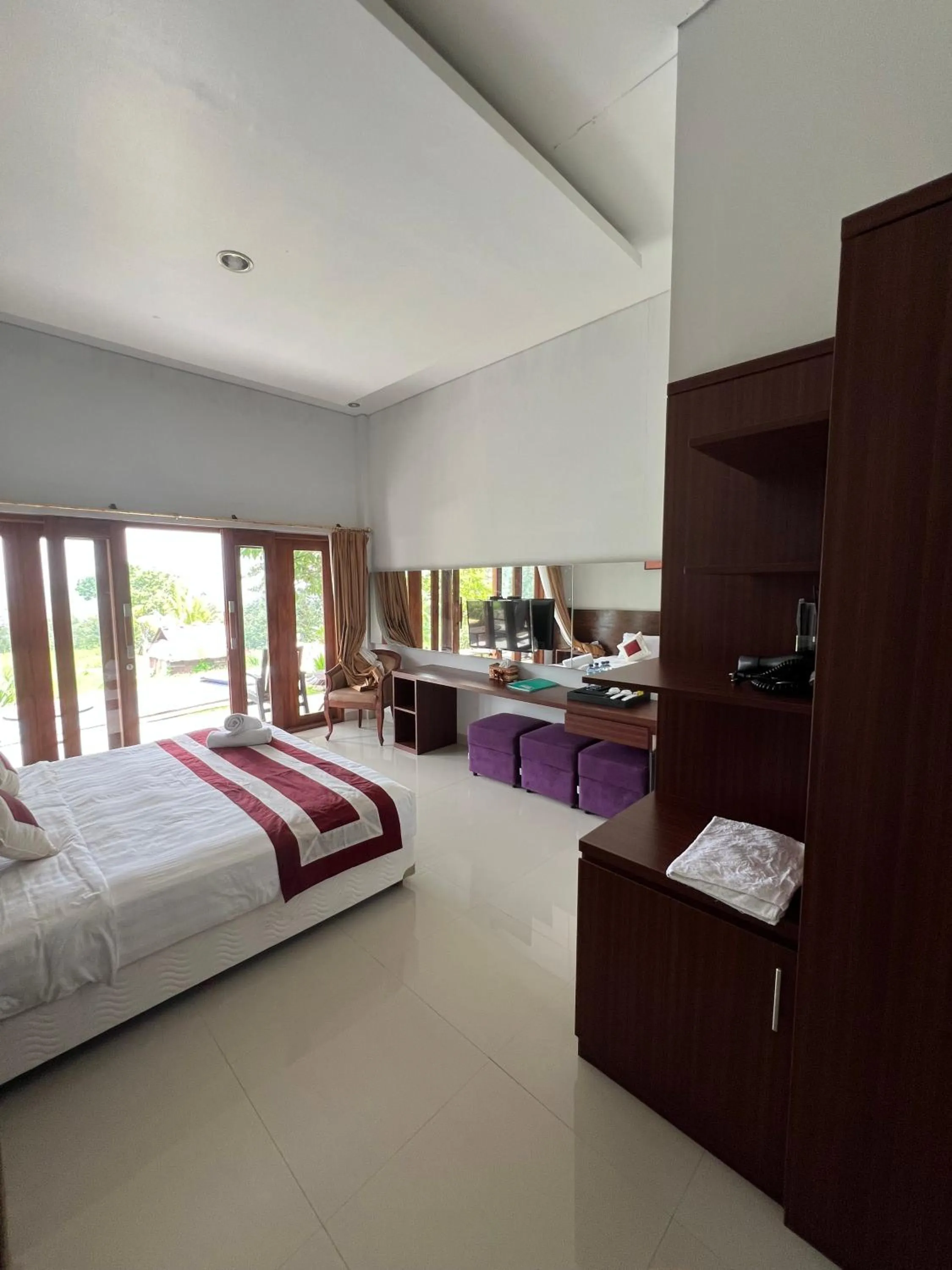 Bed in Mandhasativa Homestay