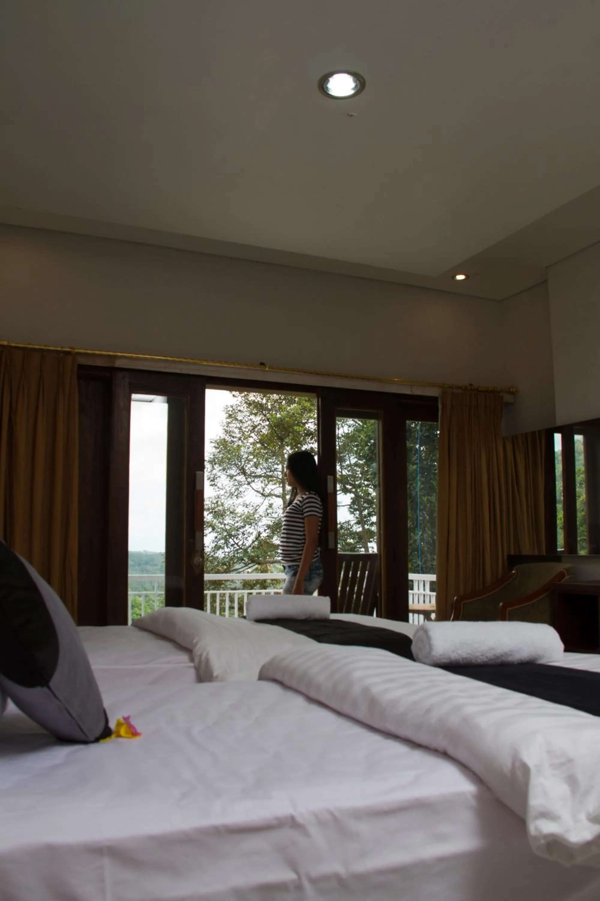 Bed in Mandhasativa Homestay