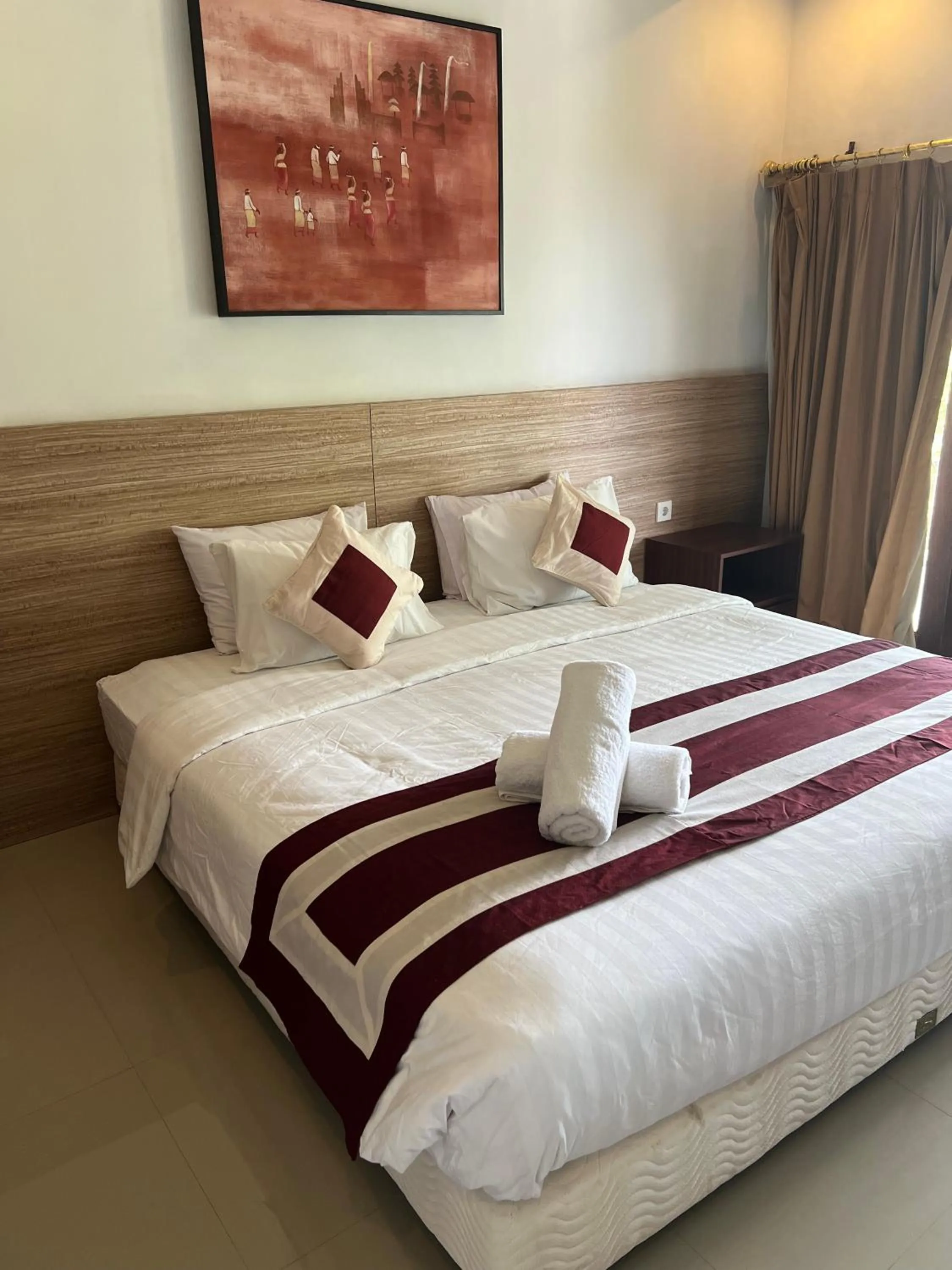 Bed in Mandhasativa Homestay