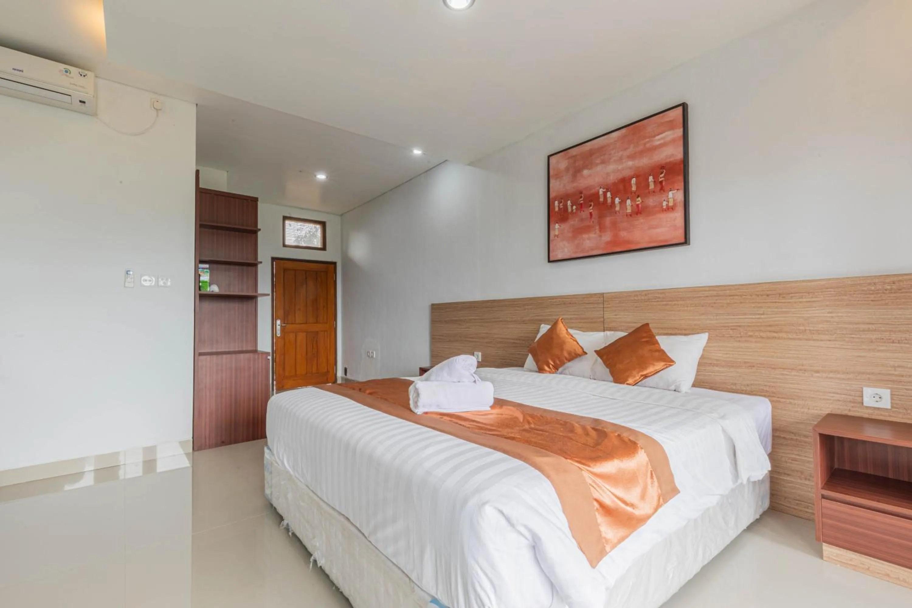 Bed in Mandhasativa Homestay