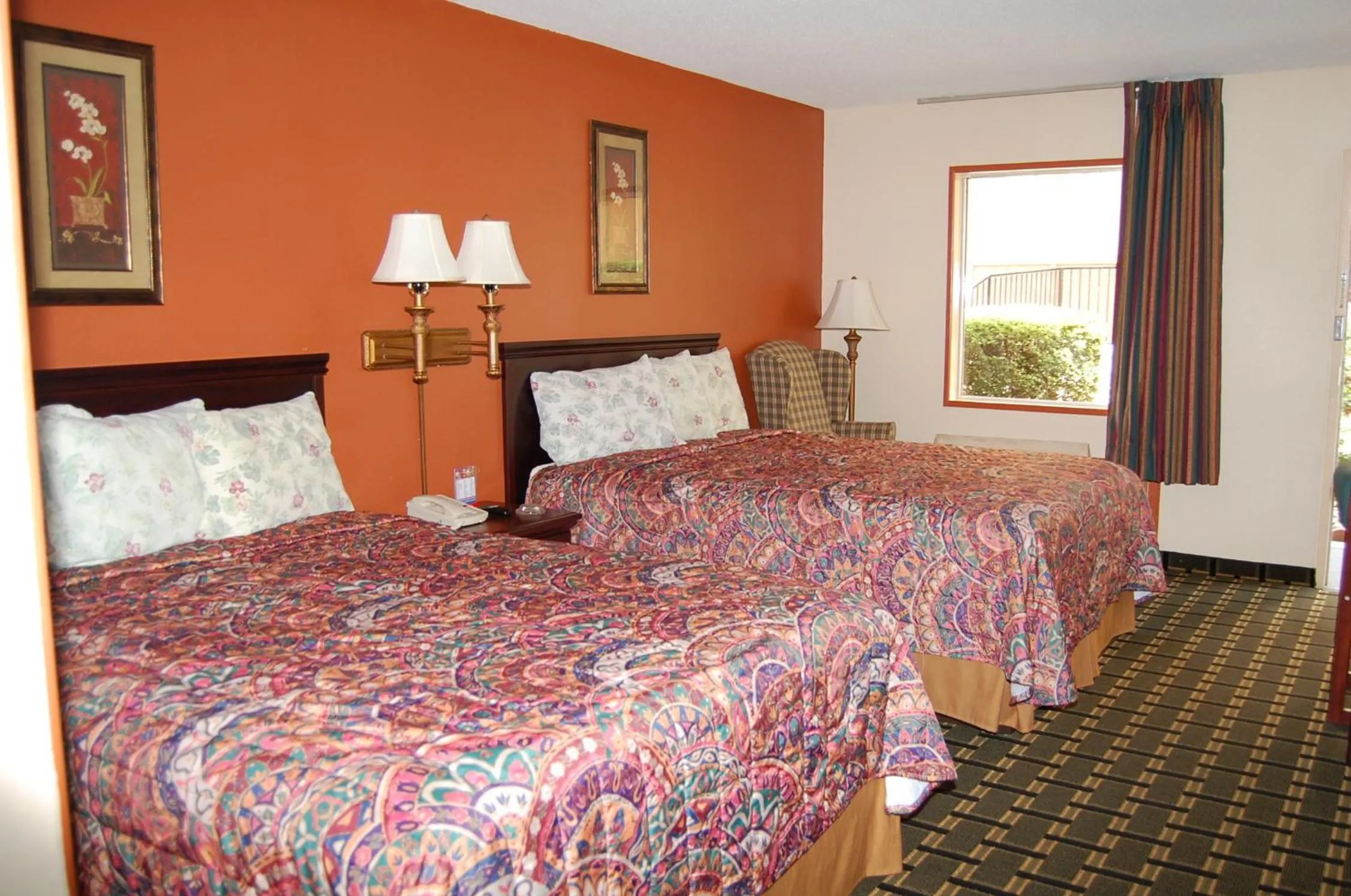 Bed in Executive Inn and Suites Springdale