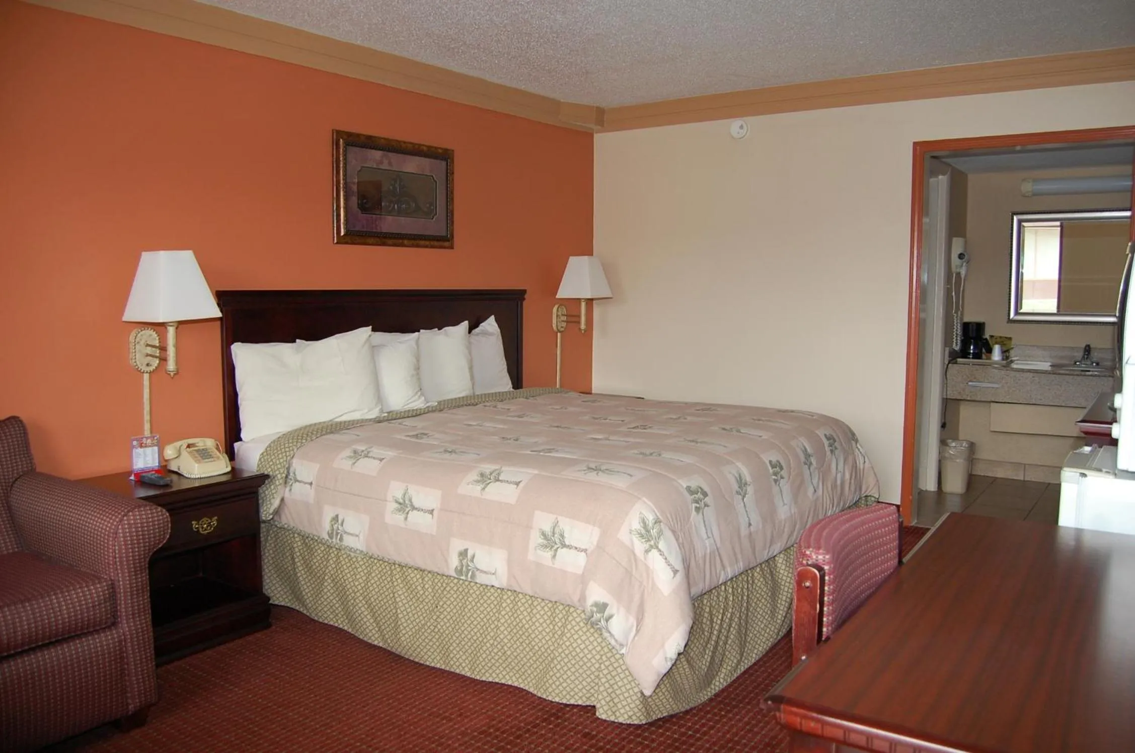 Bed in Executive Inn and Suites Springdale