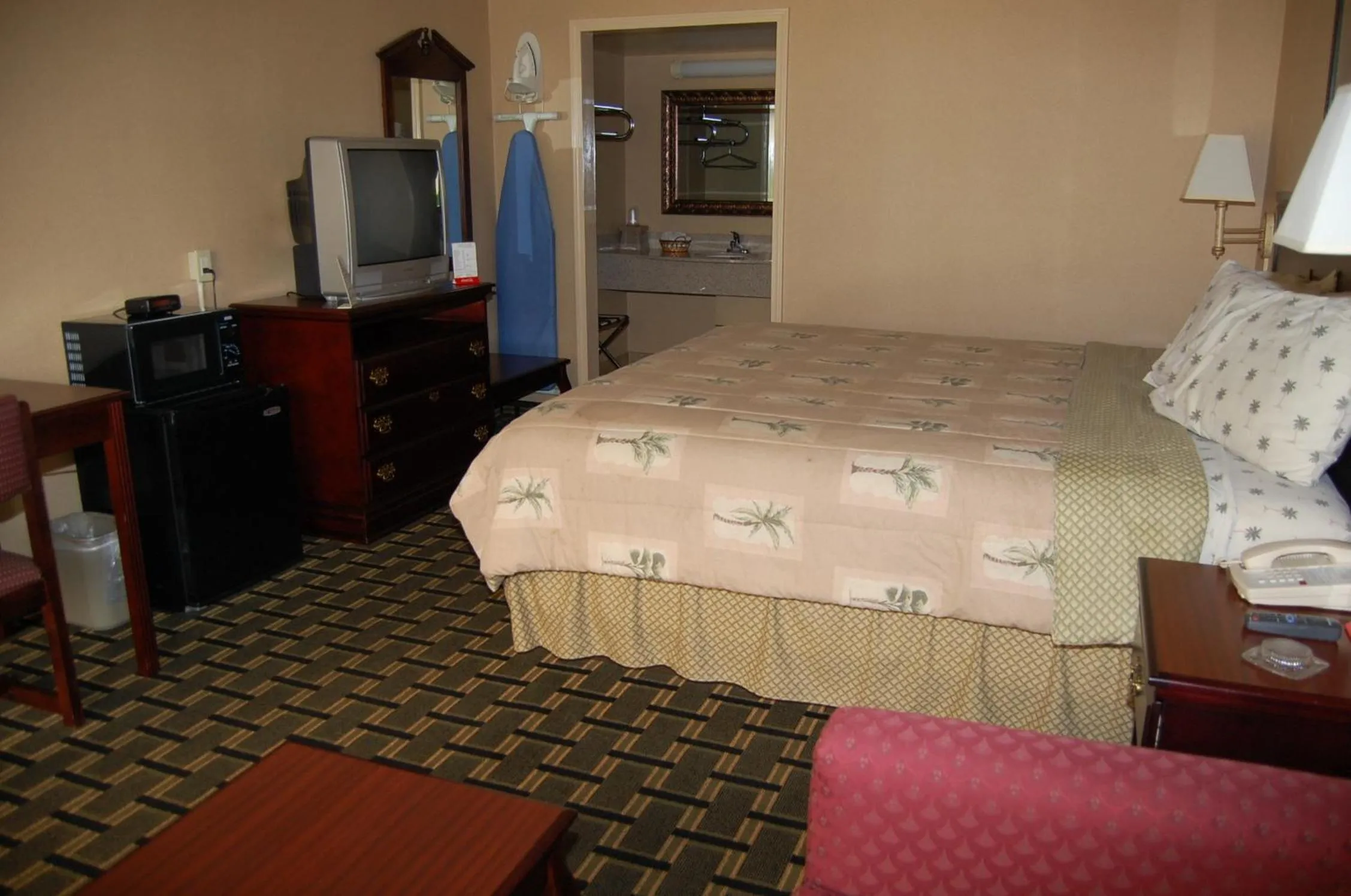 Bed in Executive Inn and Suites Springdale