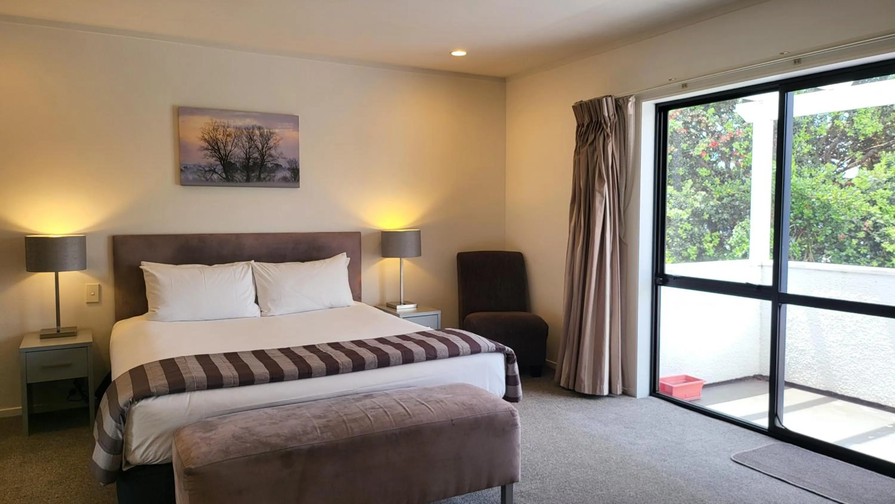 Bed in Manukau Motor Lodge