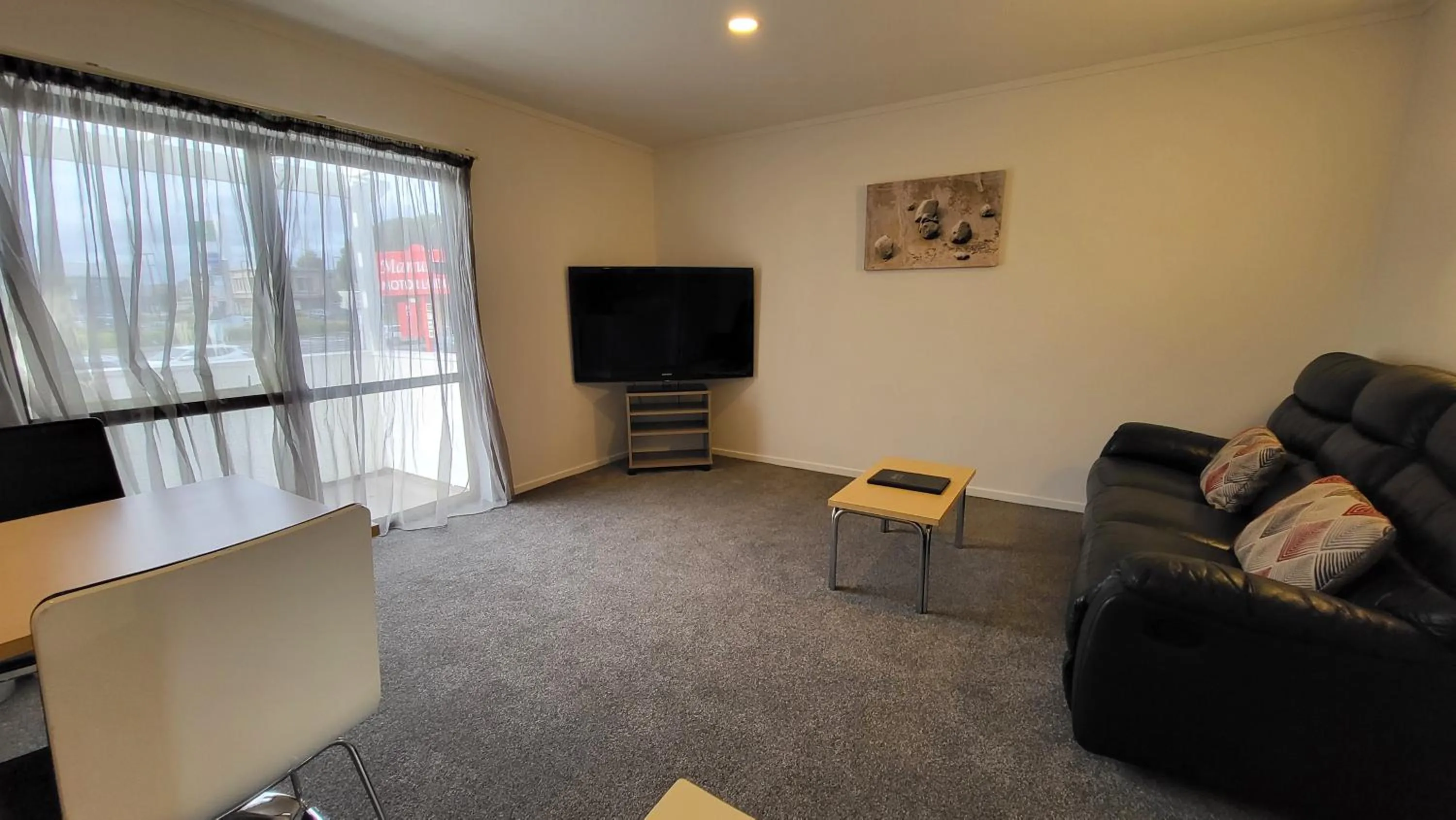 Living room in Manukau Motor Lodge