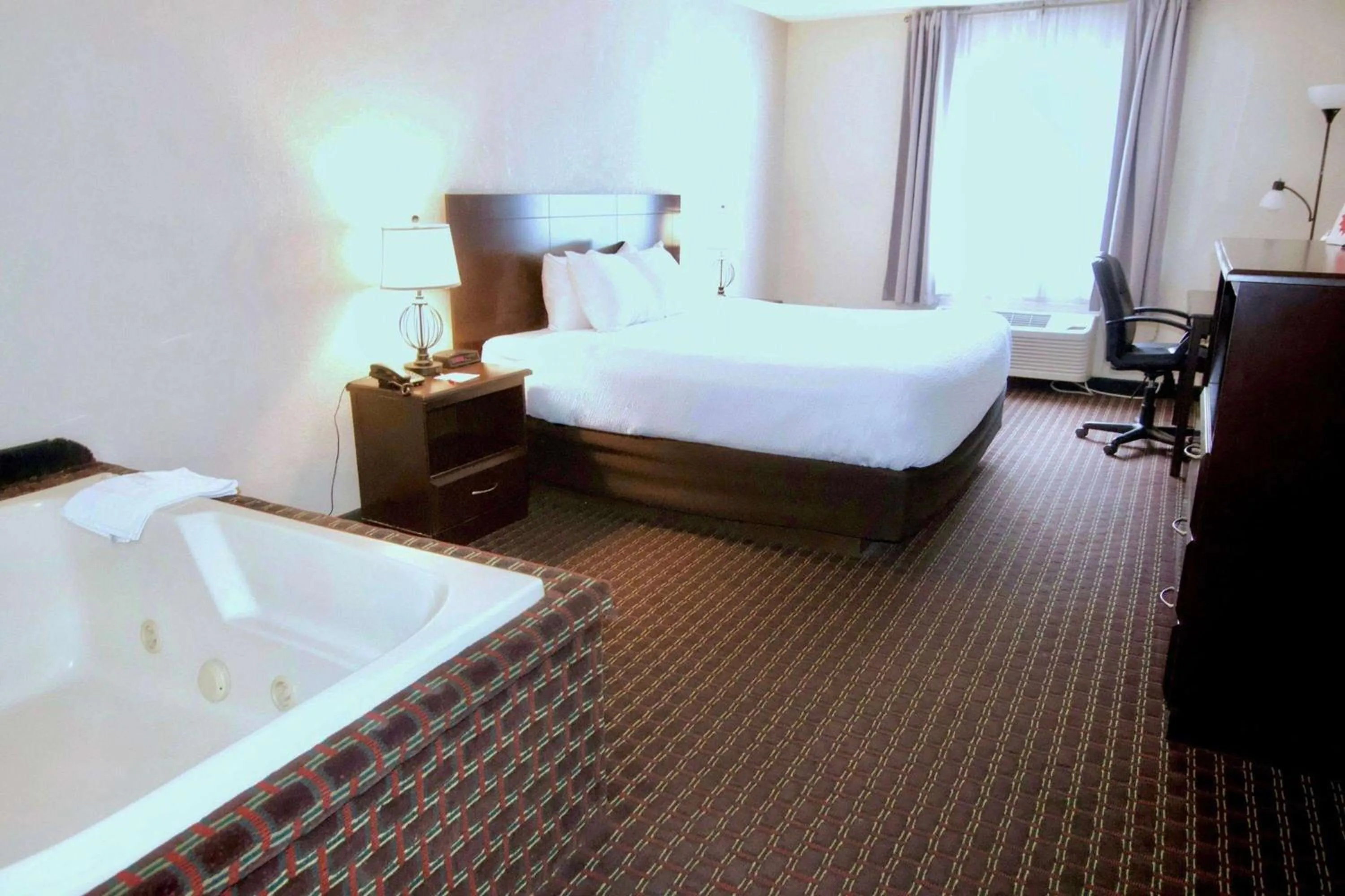 Photo of the whole room, Bed in Ramada by Wyndham Tell City