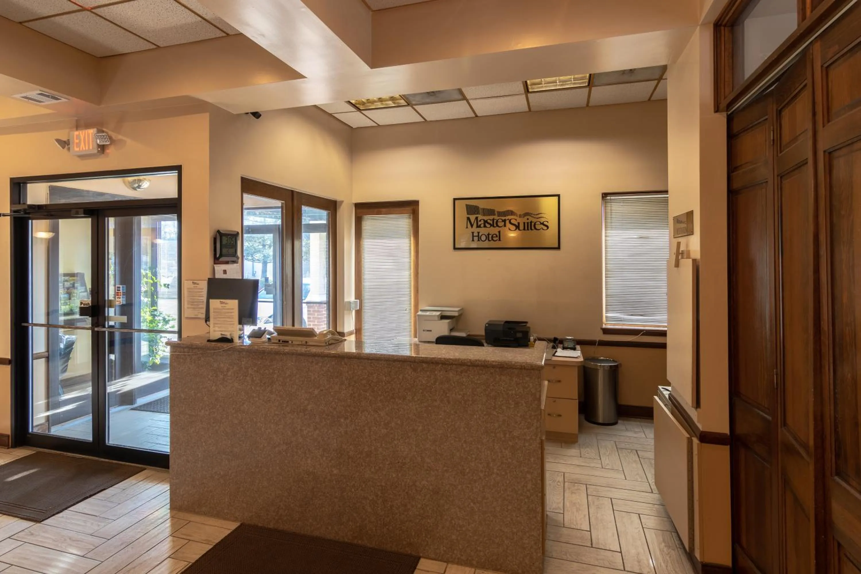 concierge in Master Suites Hotel