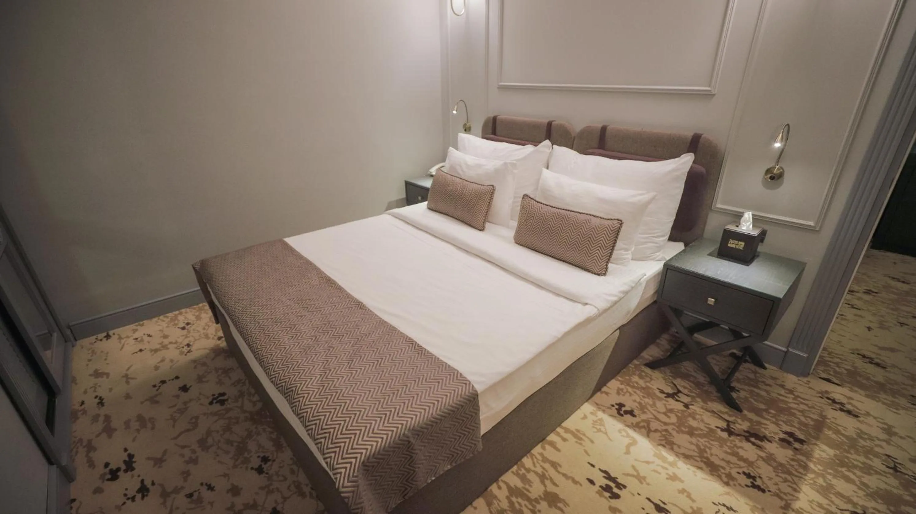 Bed in Teatro Rooms Hotel