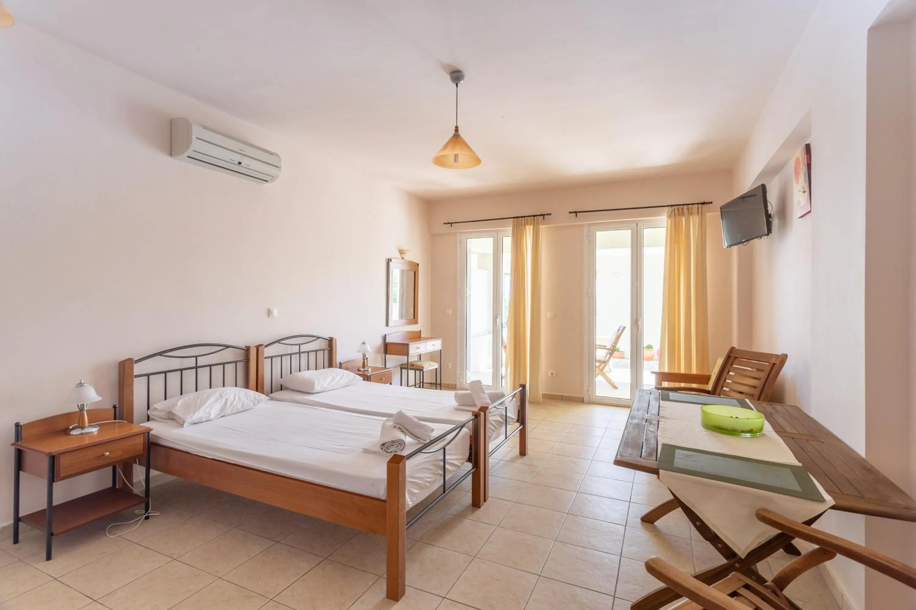 Bed in Hotel Aphrodite