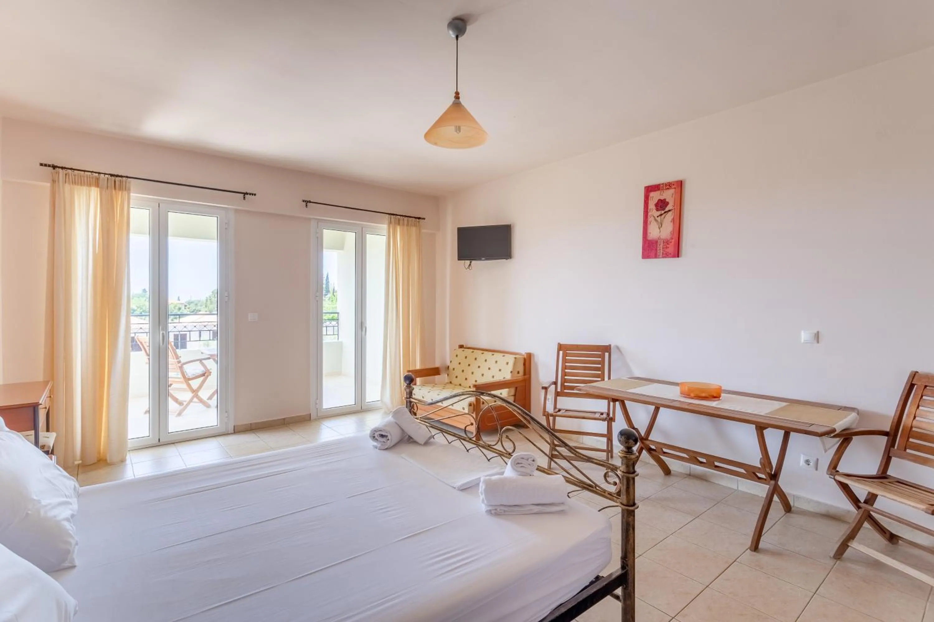 Bed in Hotel Aphrodite