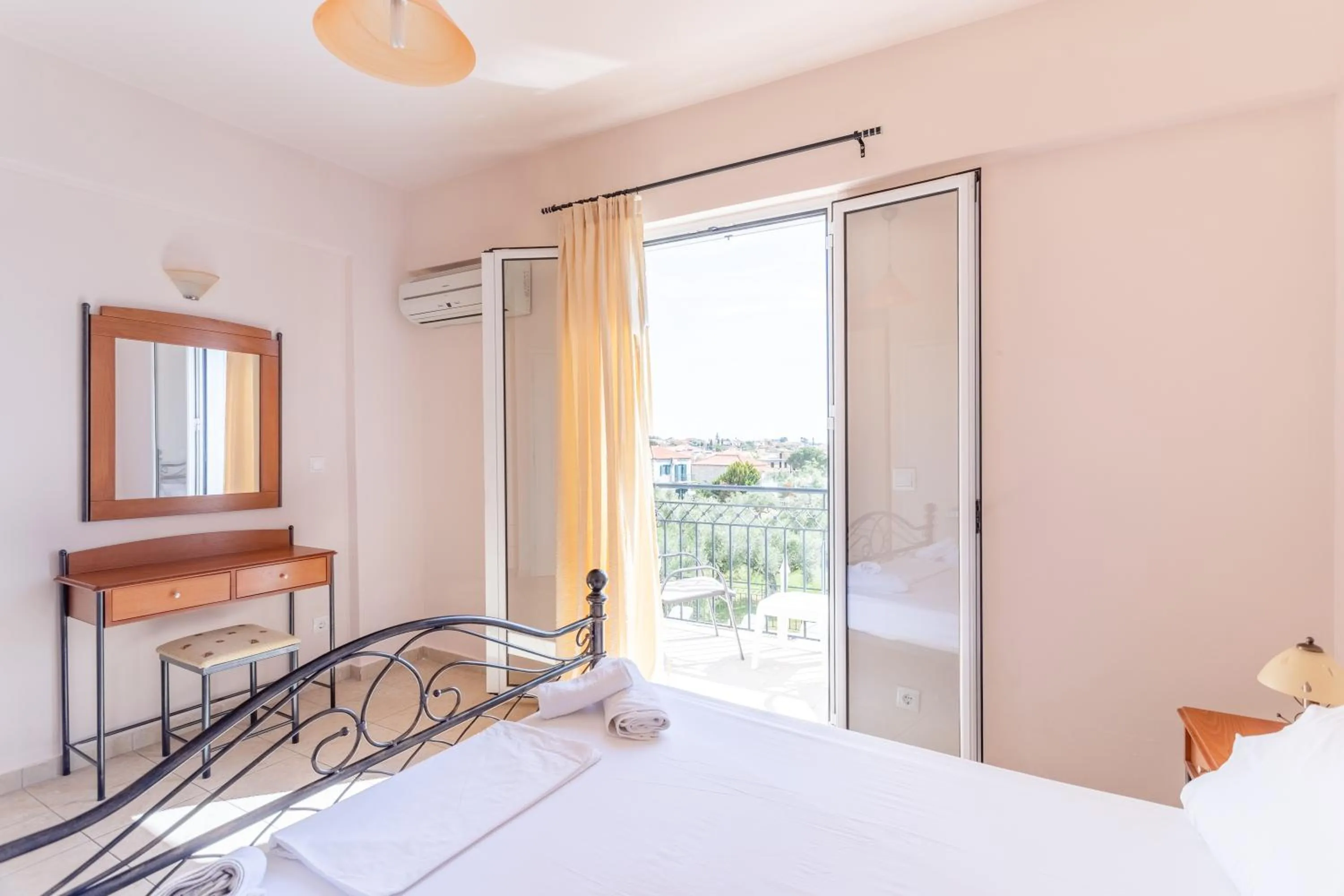 Bed in Hotel Aphrodite