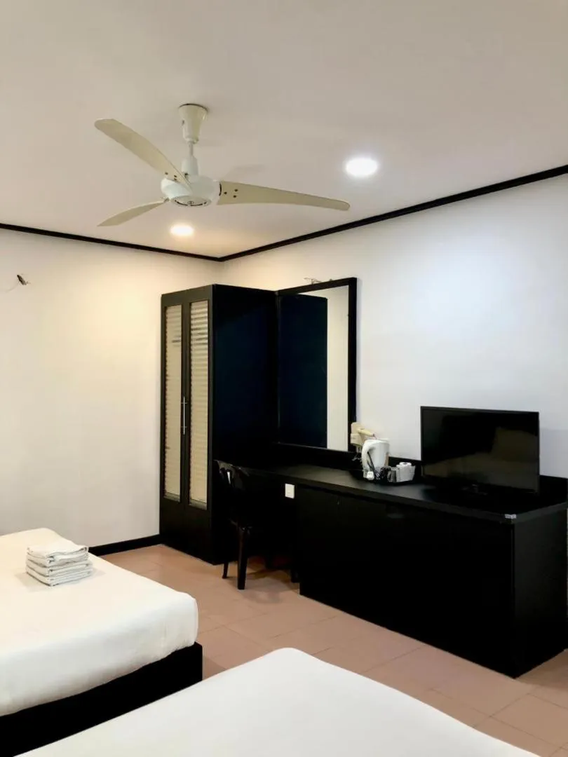 Bed in Intan Beach Resort