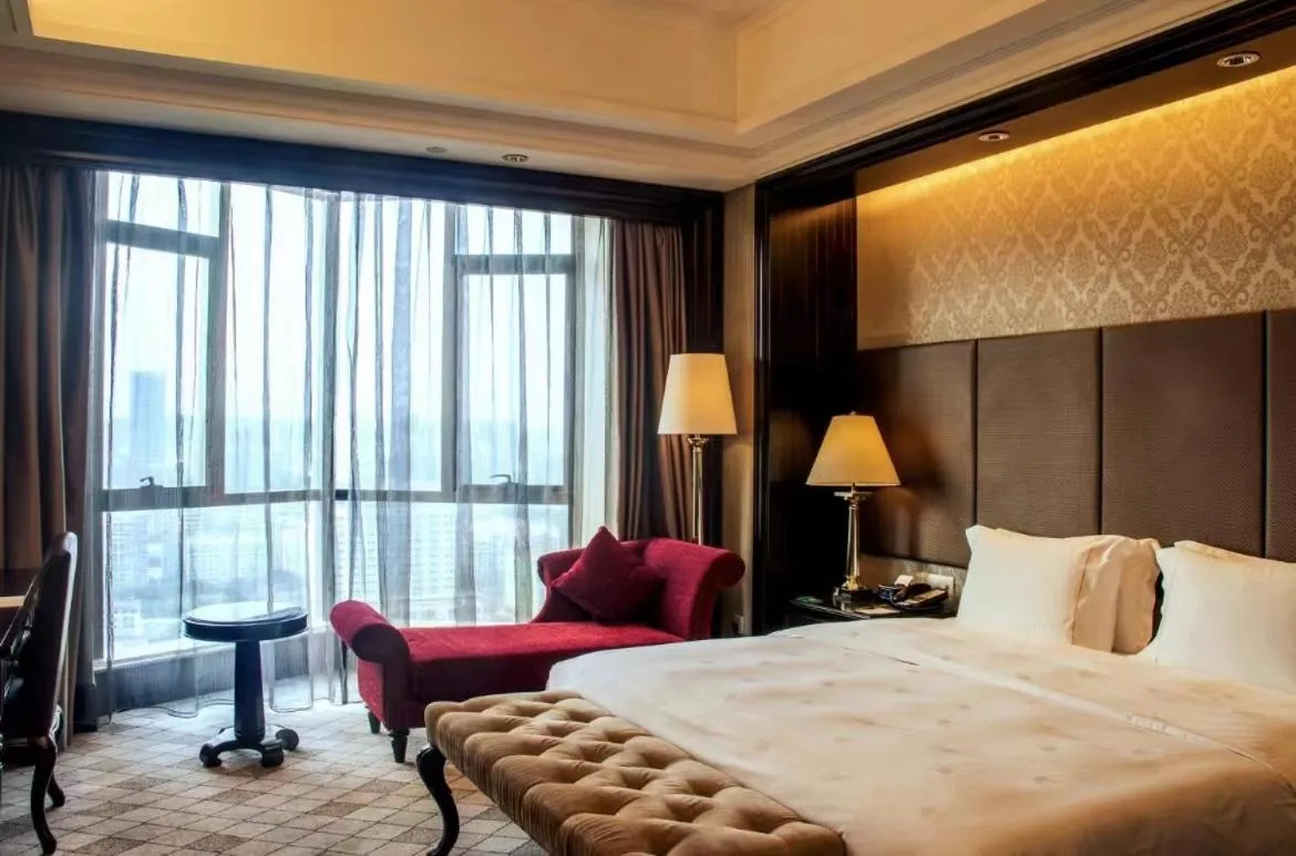 Bed in The COLI Hotel Shenzhen