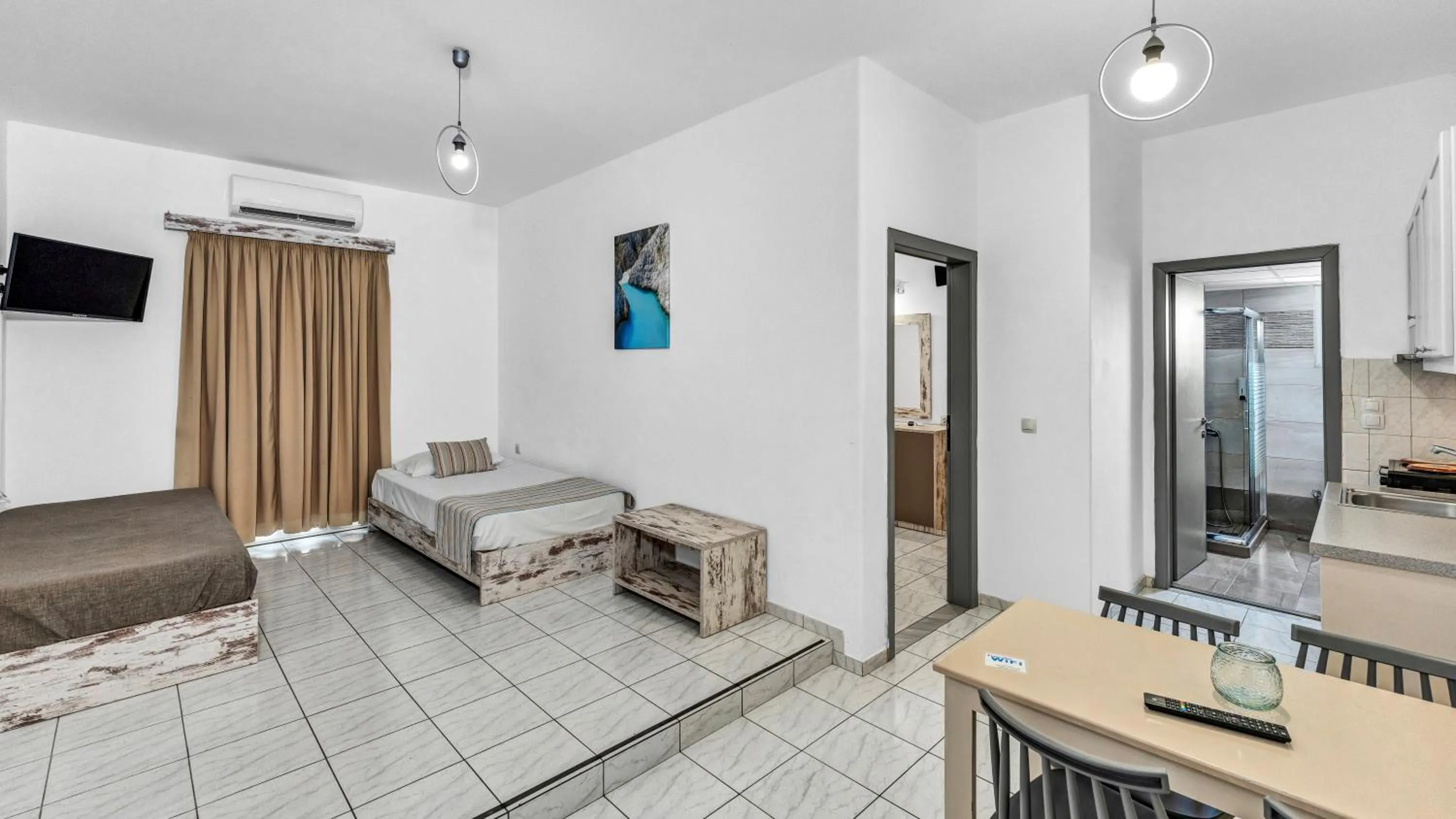 TV and multimedia, Bed in Evina Rooms & Suites