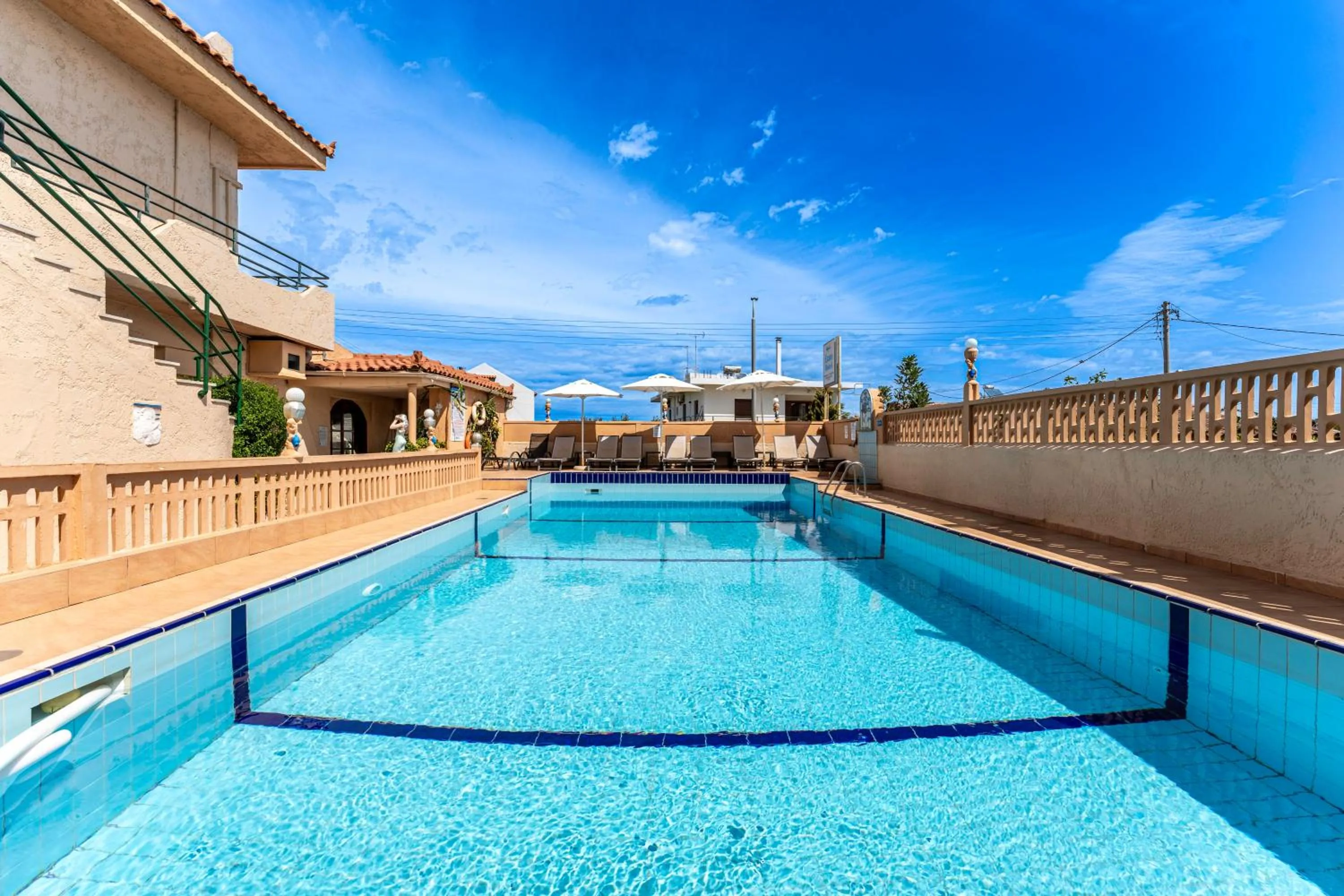 Swimming pool in Evina Rooms & Suites