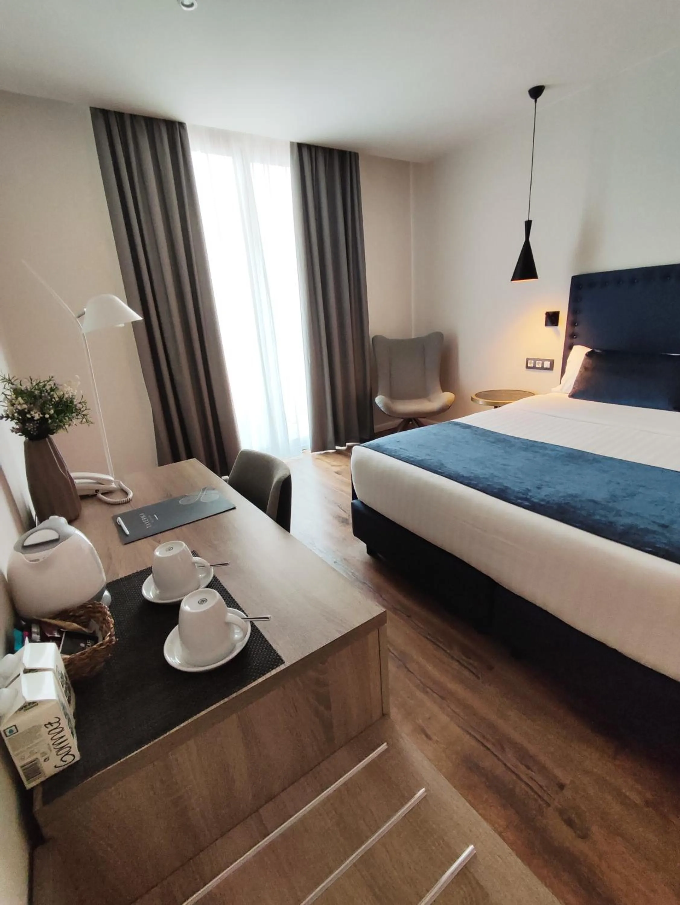 Bed in Taverna de la Sal Boutique Hotel