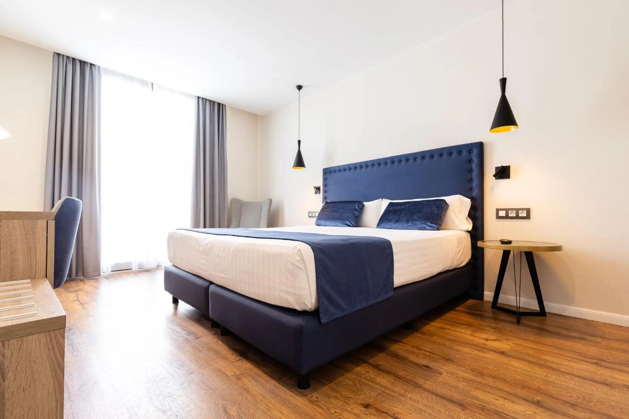 Bed in Taverna de la Sal Boutique Hotel