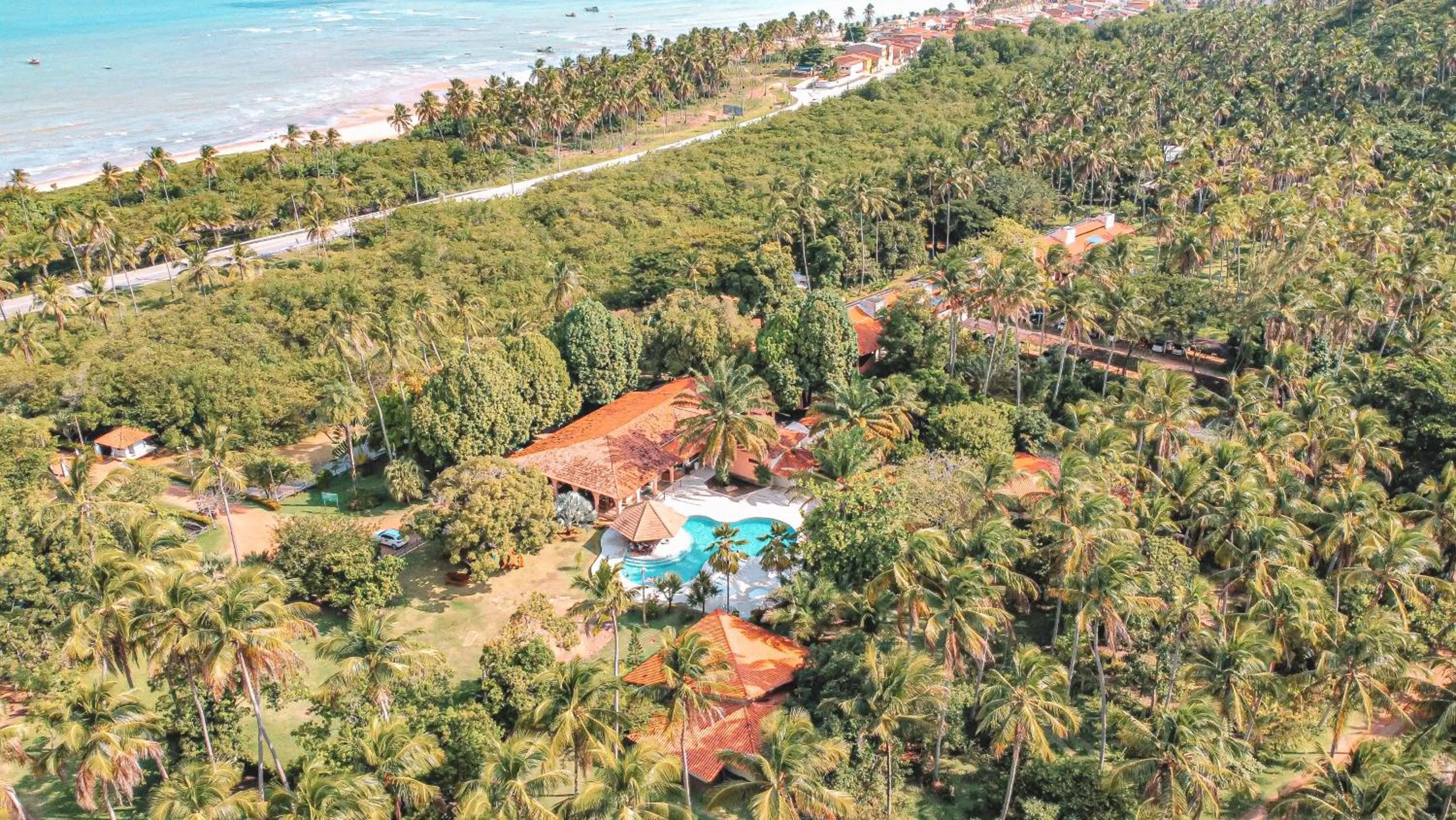 Swimming pool in Eco Pousada Paraíso dos Coqueirais