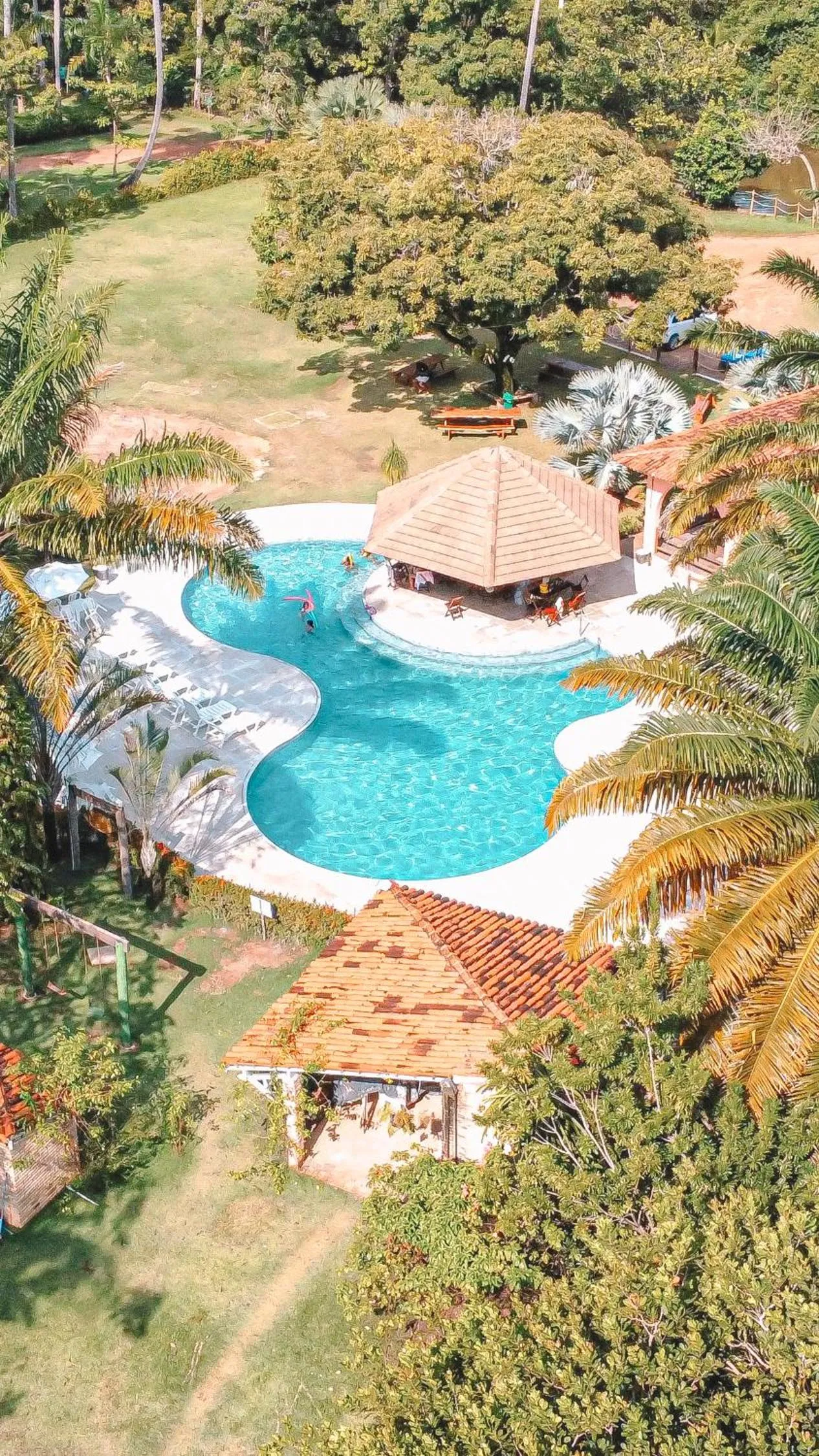 Swimming pool in Eco Pousada Paraíso dos Coqueirais