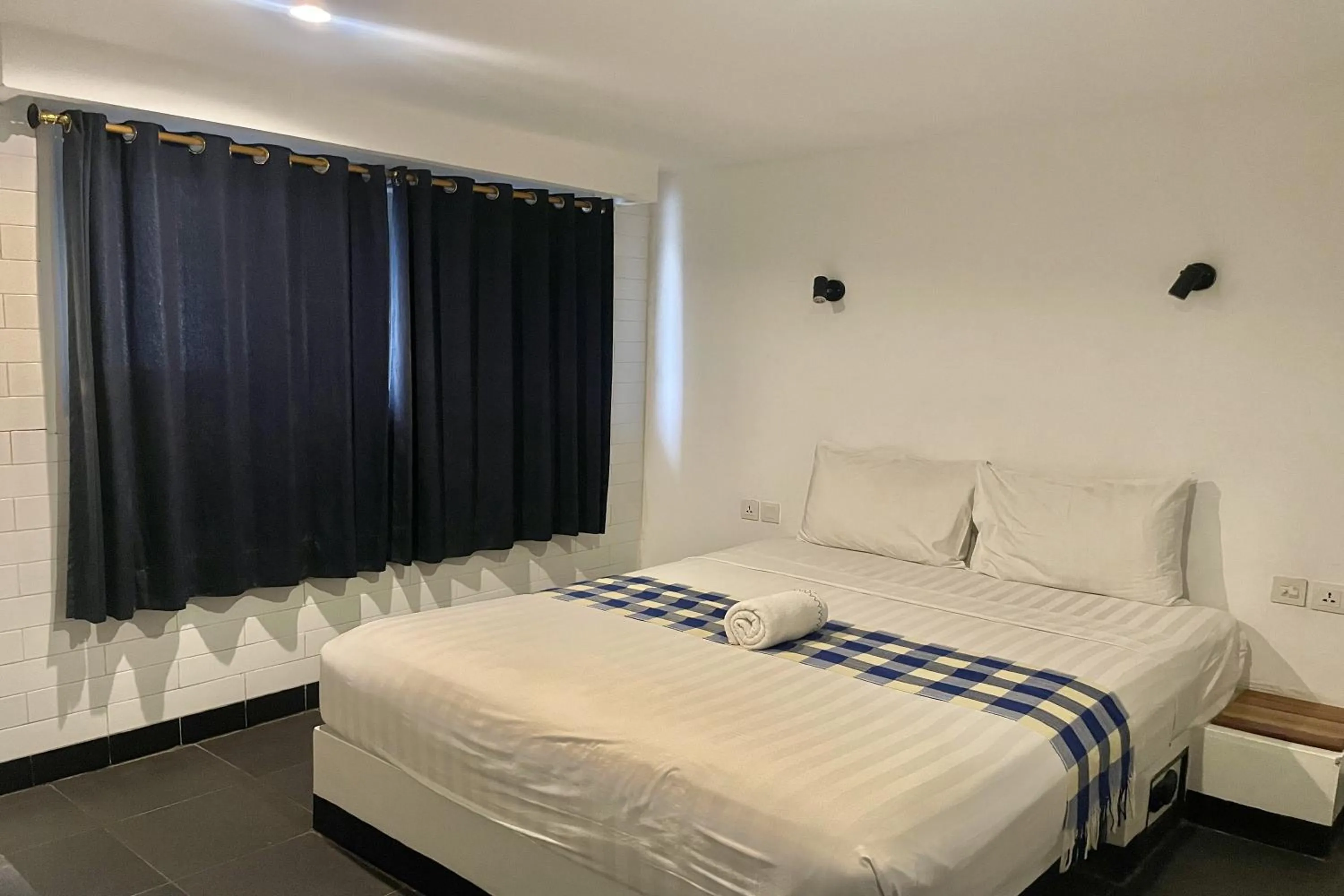 Photo of the whole room, Bed in Taman Unique Hotel Senggigi