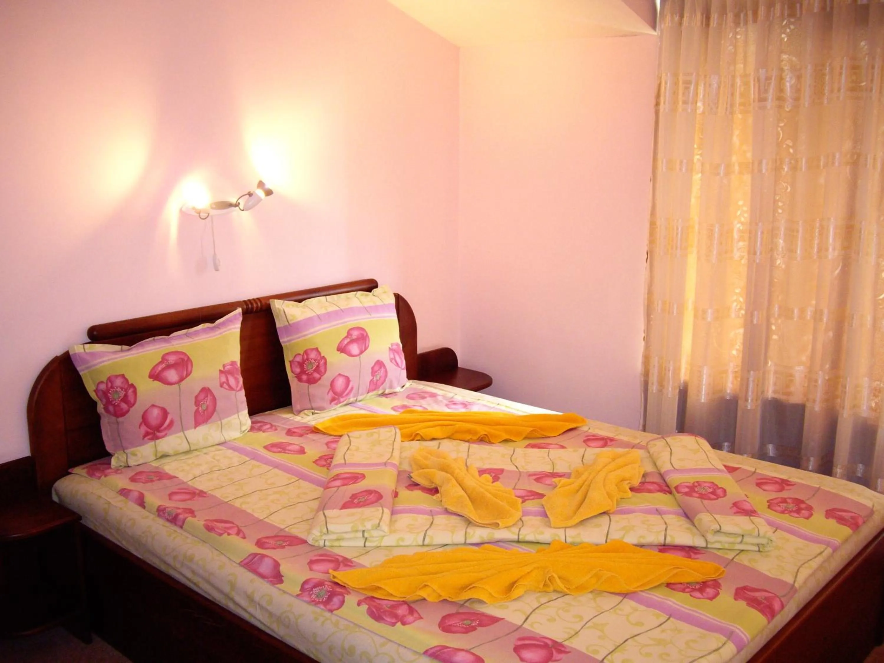 Bed in Family Hotel Iv