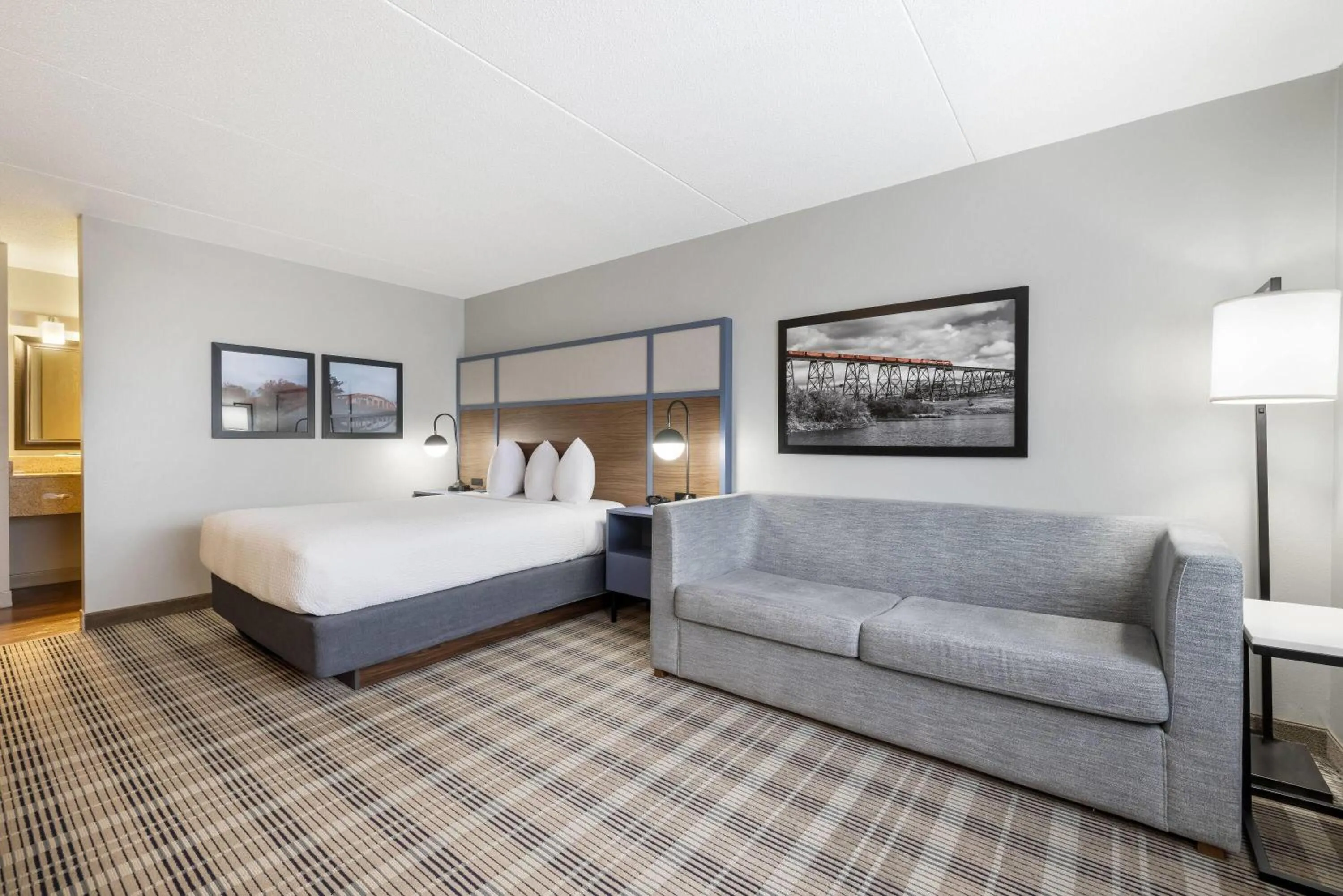 Bed in AmericInn by Wyndham Valley City Conference Center