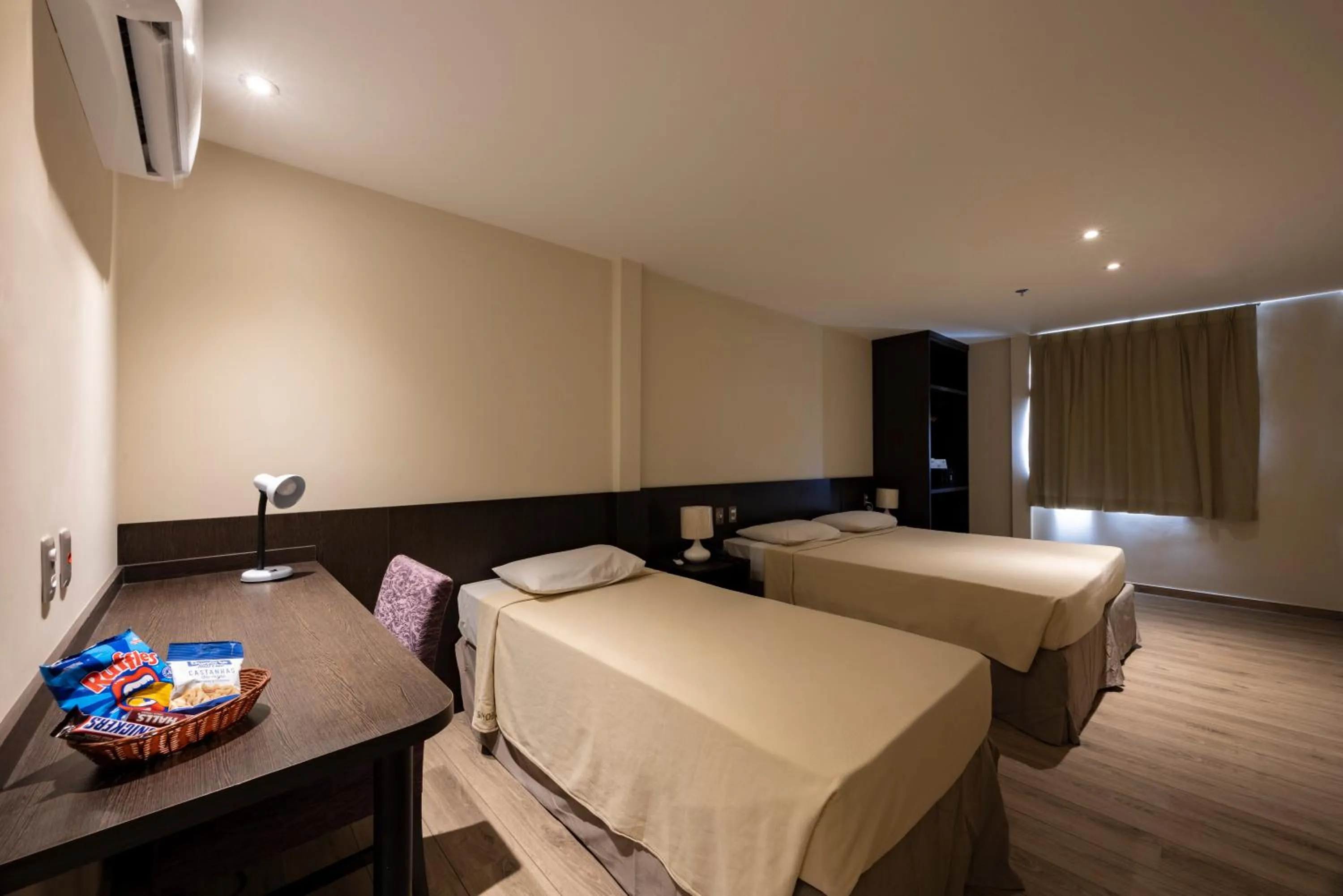 Bed in Arosa Rio Hotel