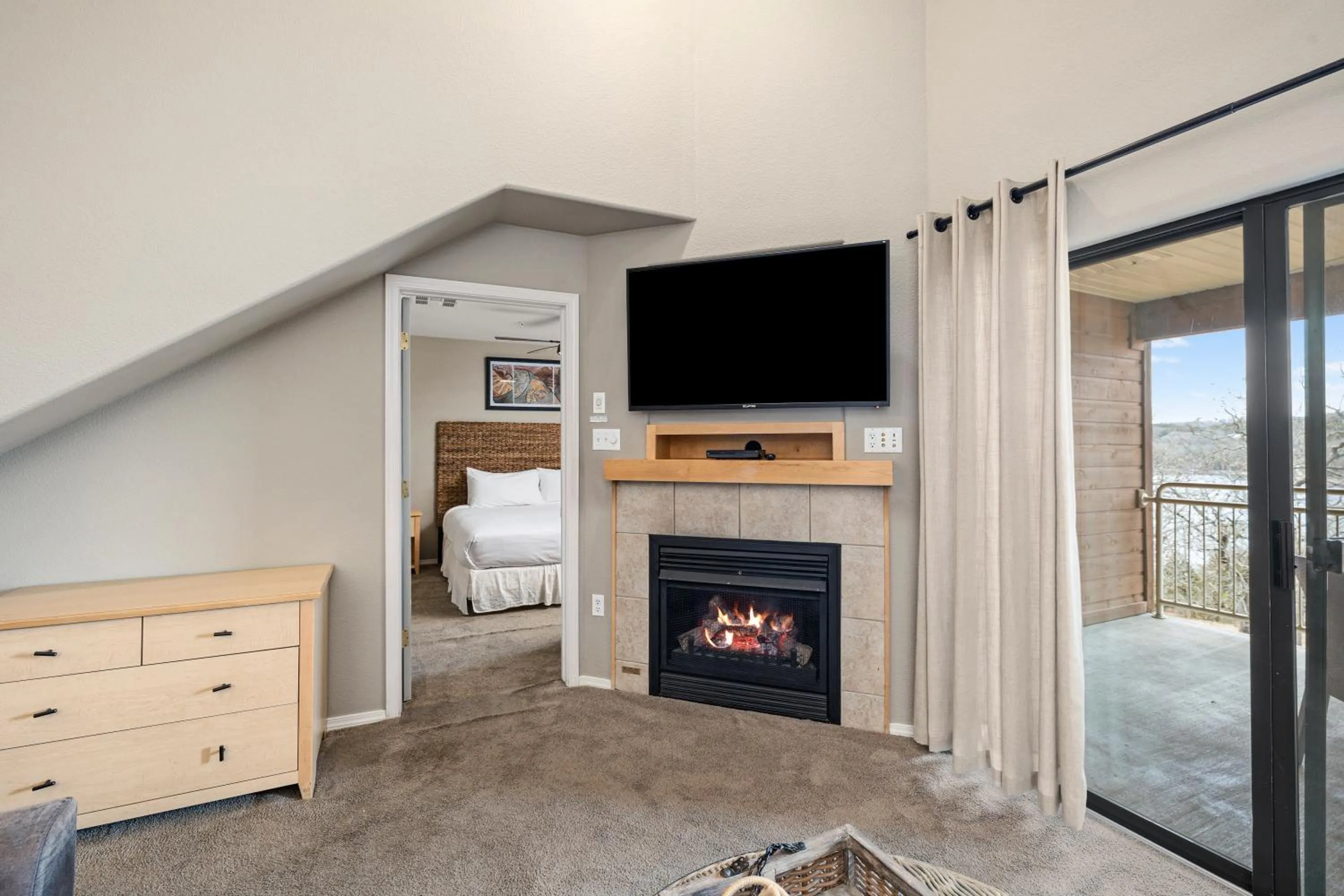 fireplace, Bed in Still Waters Resort