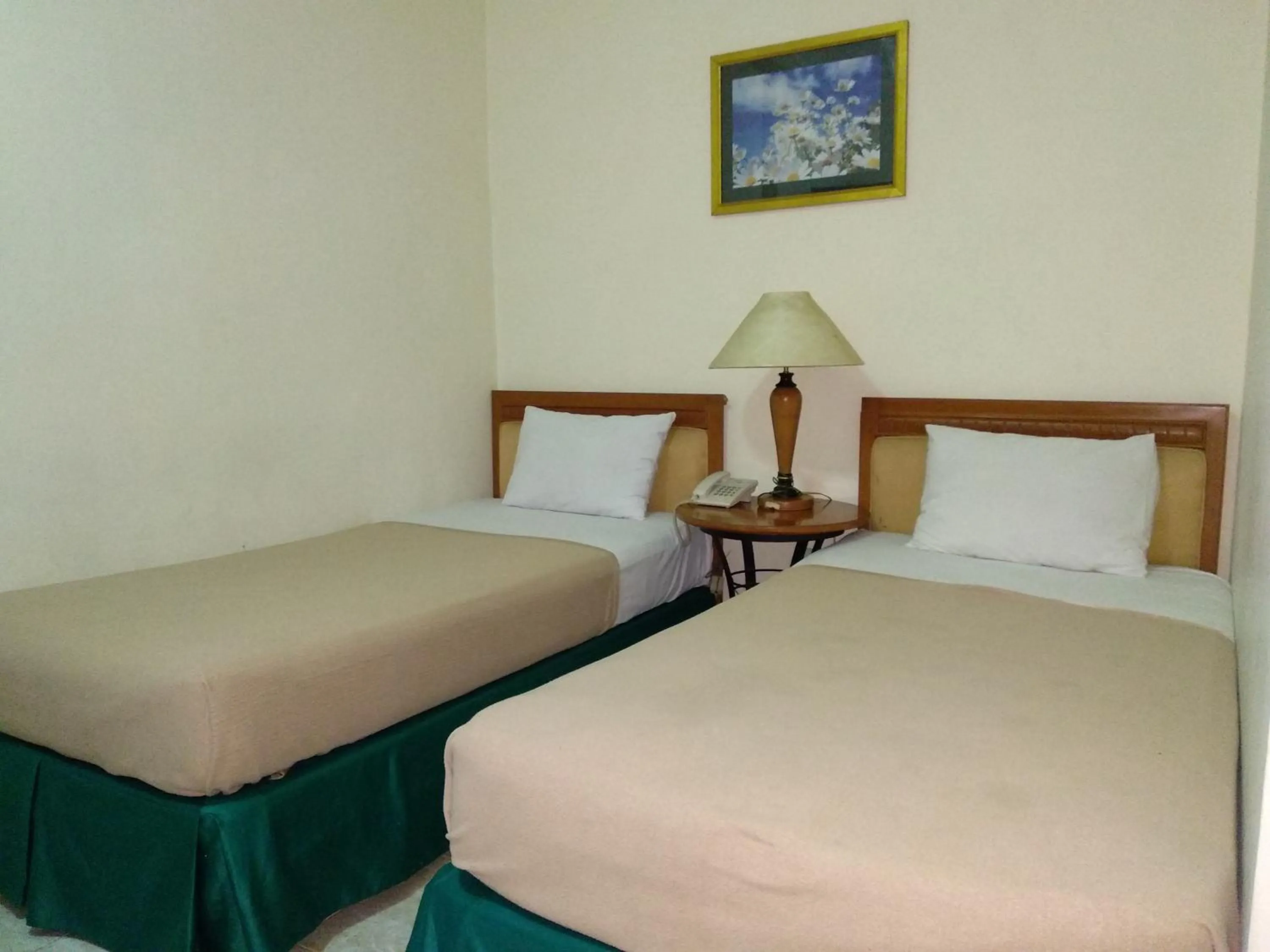 Bed in Top Star Hotel