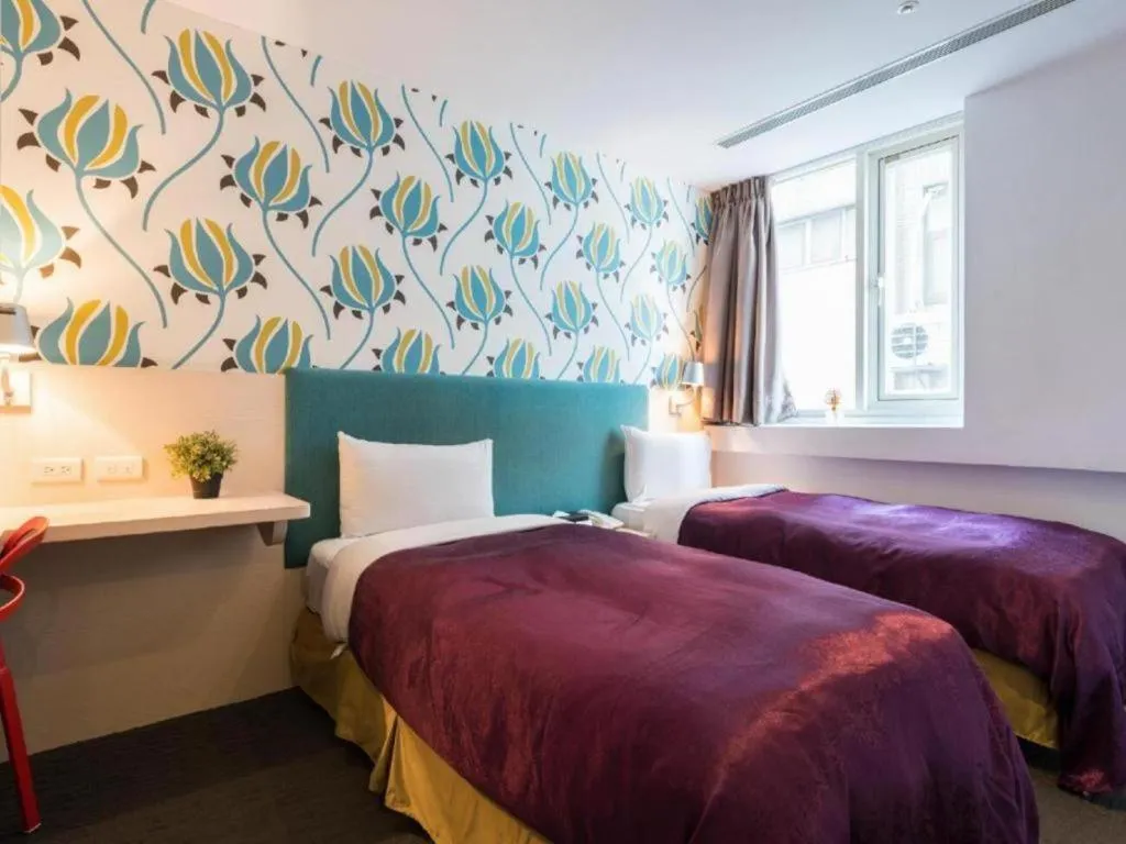 Bed in 西門大飯店 Ximen Hotel