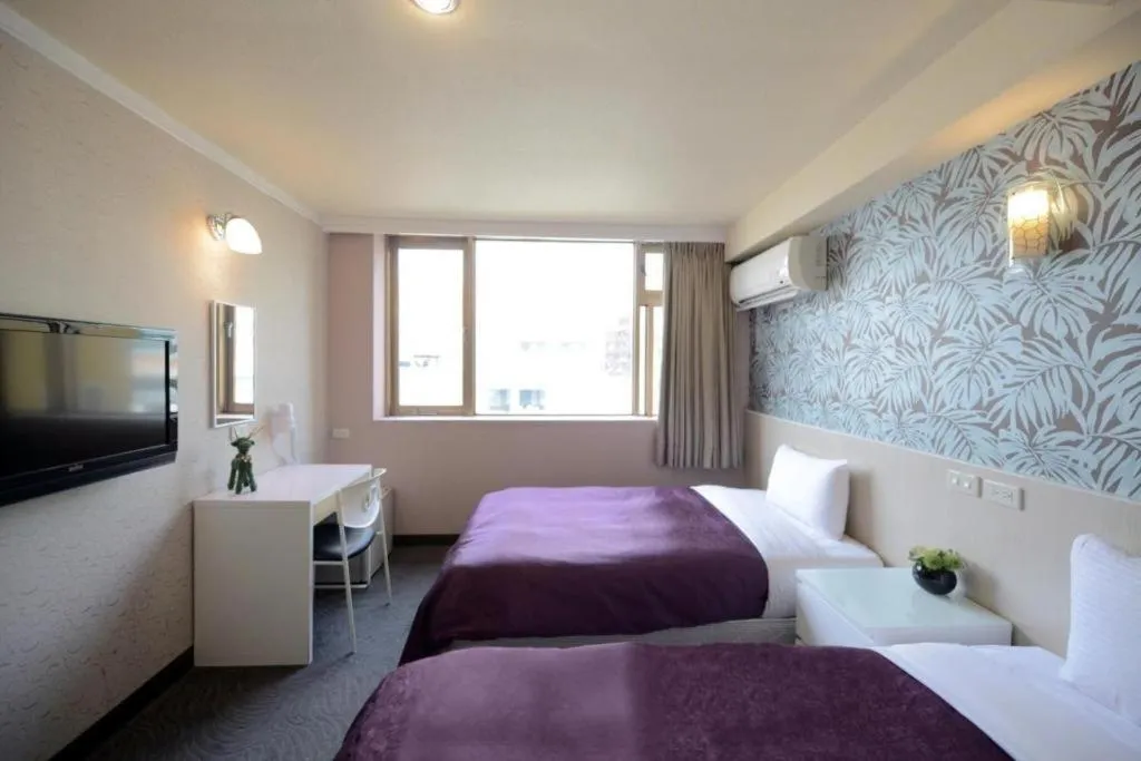 Bed in 西門大飯店 Ximen Hotel