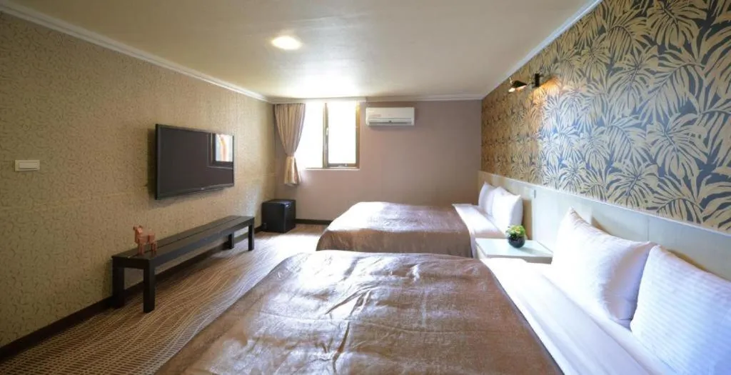 Bed in 西門大飯店 Ximen Hotel